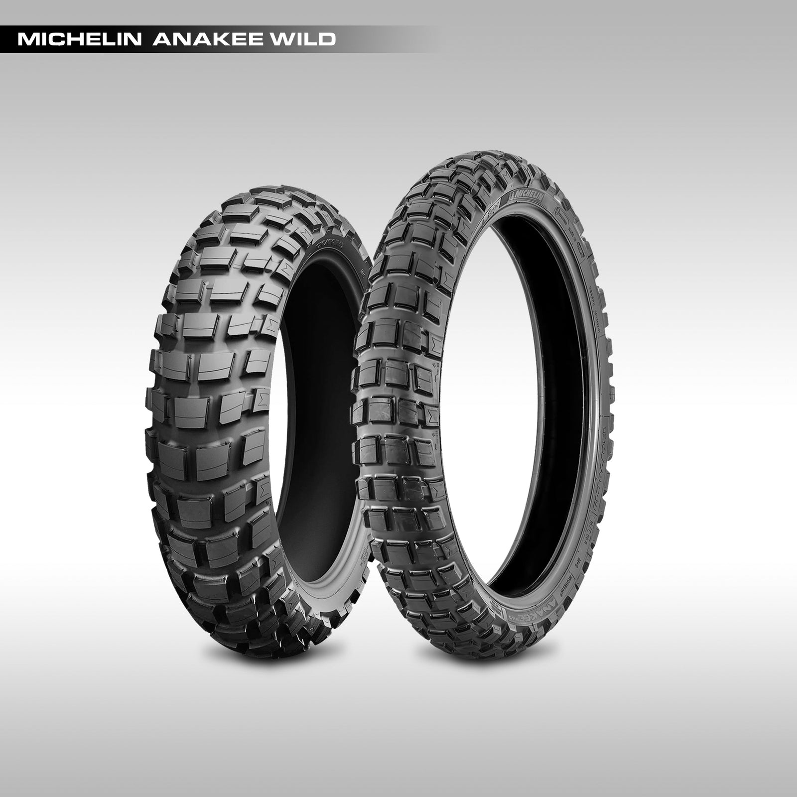 Two Michelin Anakee Wild tires on a light gray background