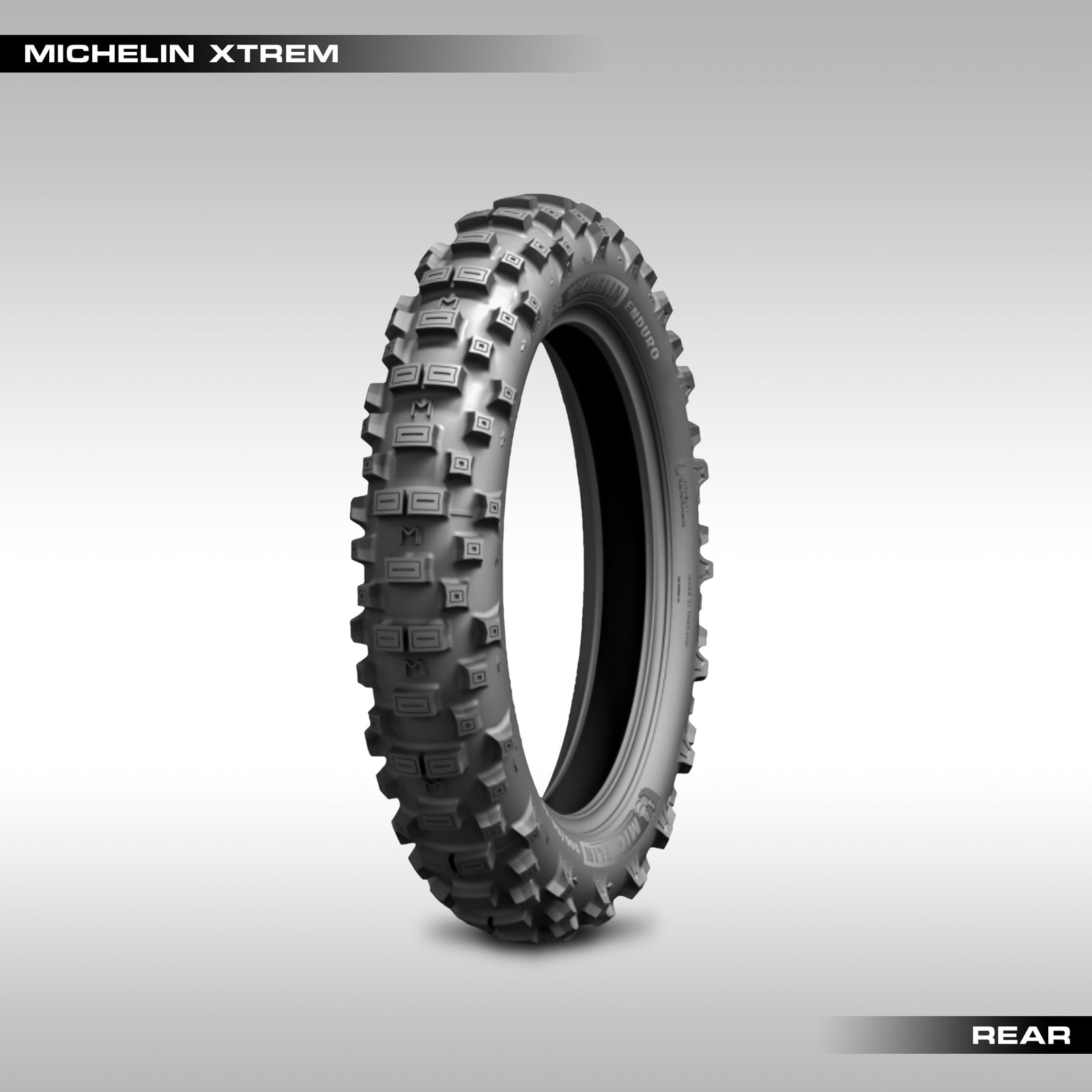Michelin Xtrem offroad motorcycle tire on a gray background