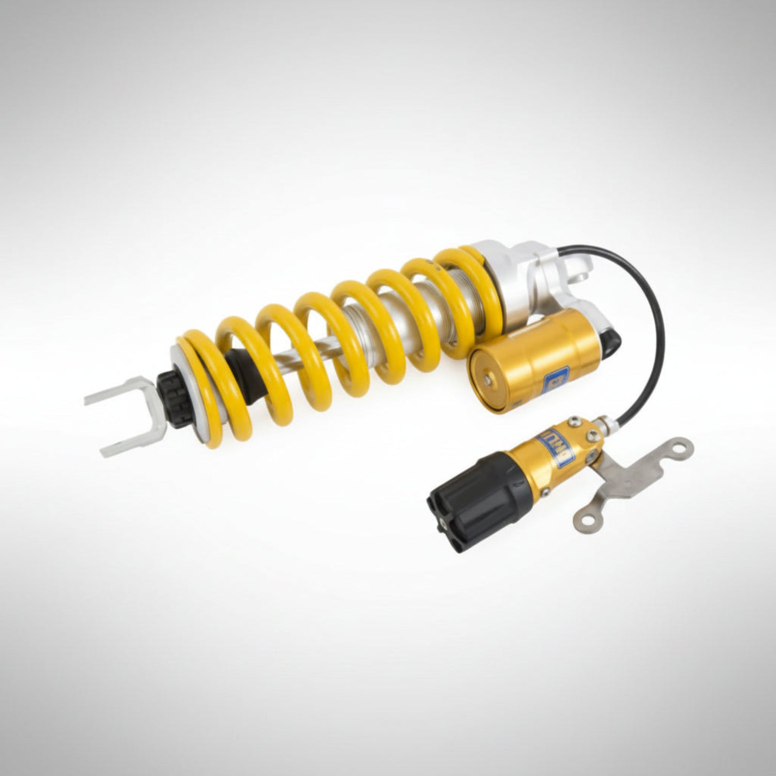 Ohlins shock absorber system on a white background