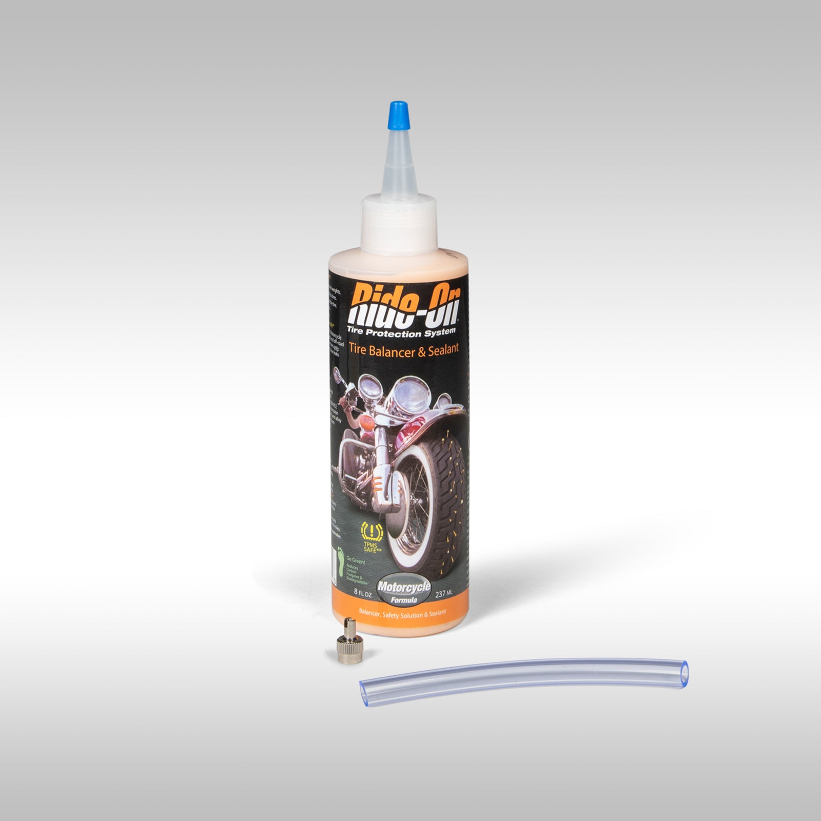 Bottle of Ride-On tire balancer and sealant with a blue cap on a light gray background