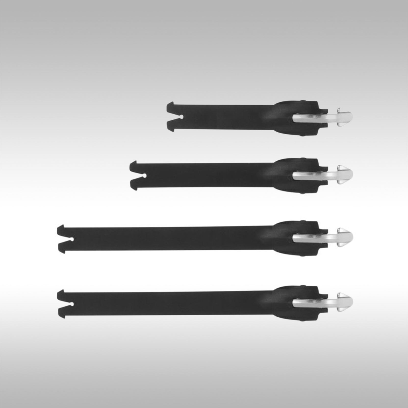 Replacement strap set for the Alpinestars Tech 7 boots. Black plastic straps with a silver aluminum buckle end.