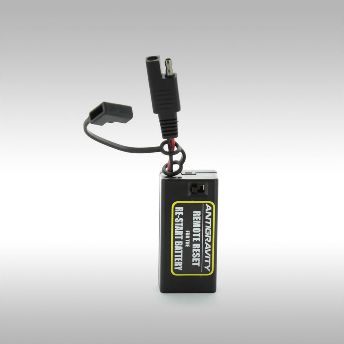 The Antigravity Re-Start Battery Remote. Plug this dongle into the SAE charging cable attached to your bike and activate your re-start battery