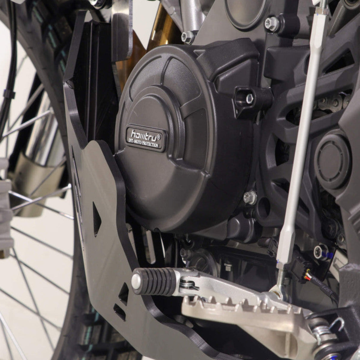 Black AXP Racing 8mm HDPE adventure skid plate installed on a Kove 800X Rally motorcycle.