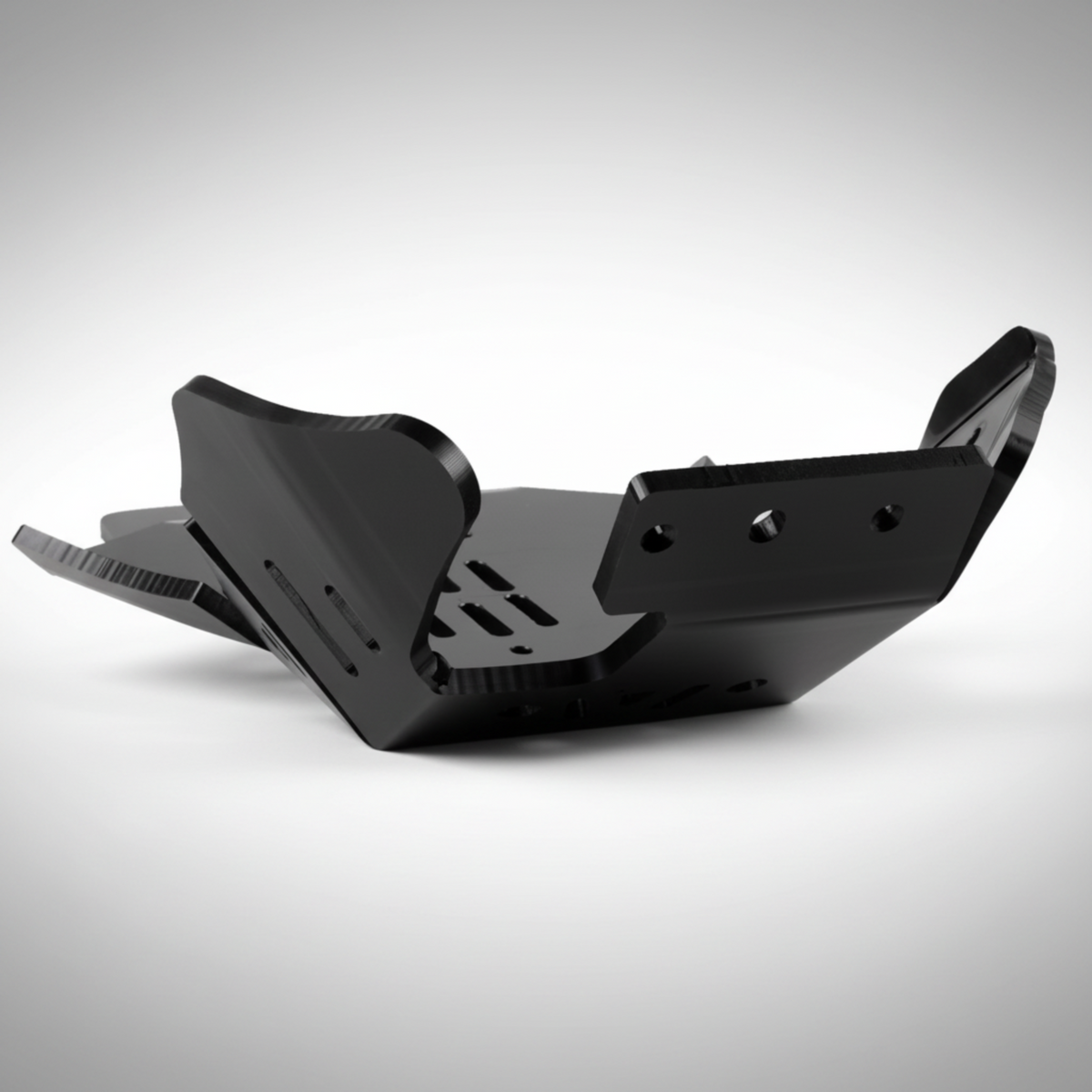 AXP Racing 8mm HDPE skid plate with integrated linkage guard installed on a Beta X-Trainer dirt bike.