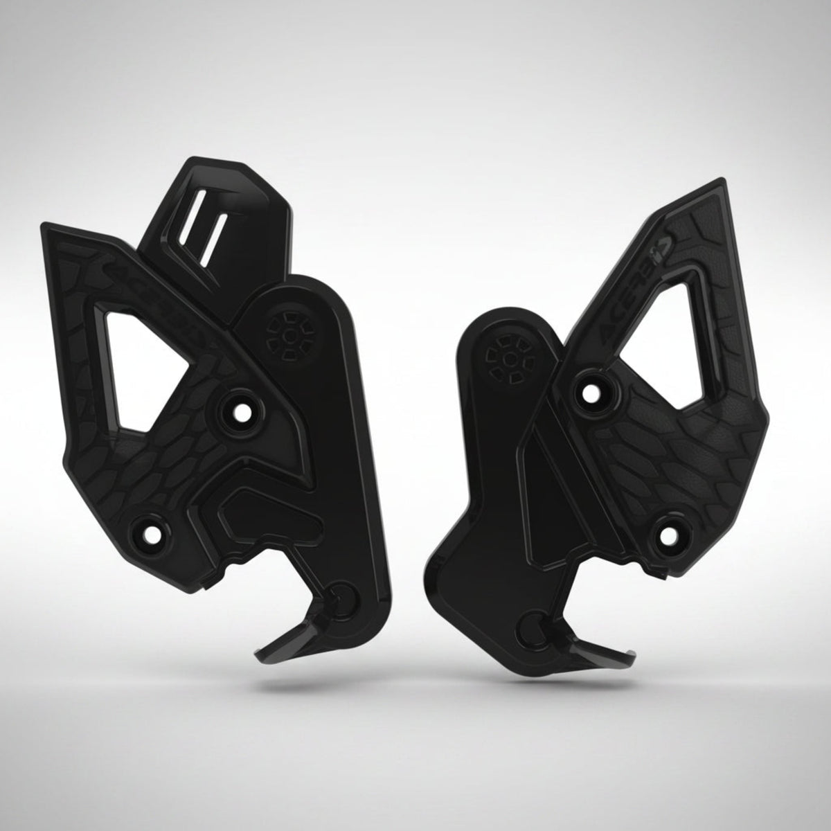 Black Acerbis X-Grip frame guards showing rubberized grip panels installed on a CFMOTO Ibex 450 adventure motorcycle.
