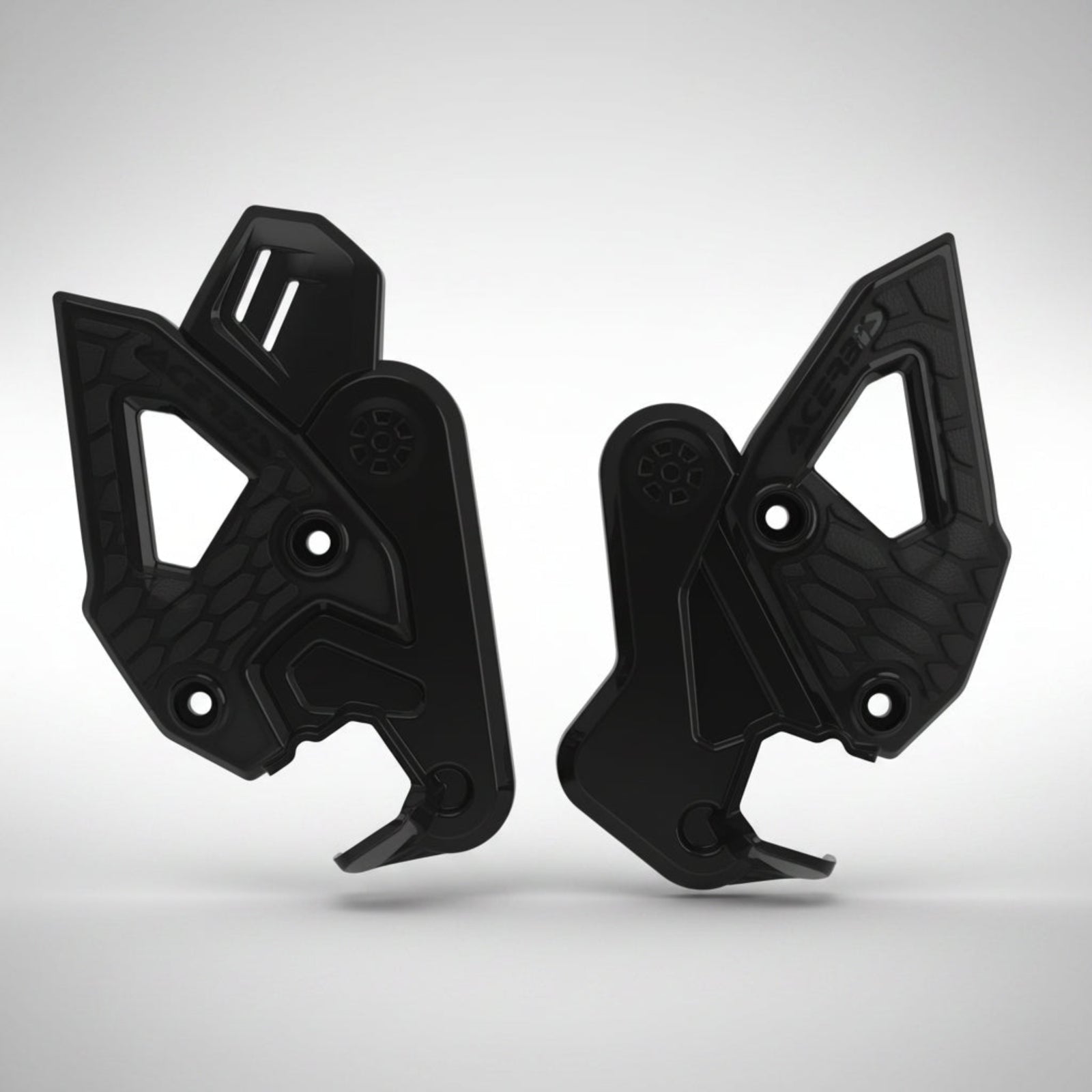 Black Acerbis X-Grip frame guards showing rubberized grip panels installed on a CFMOTO Ibex 450 adventure motorcycle.