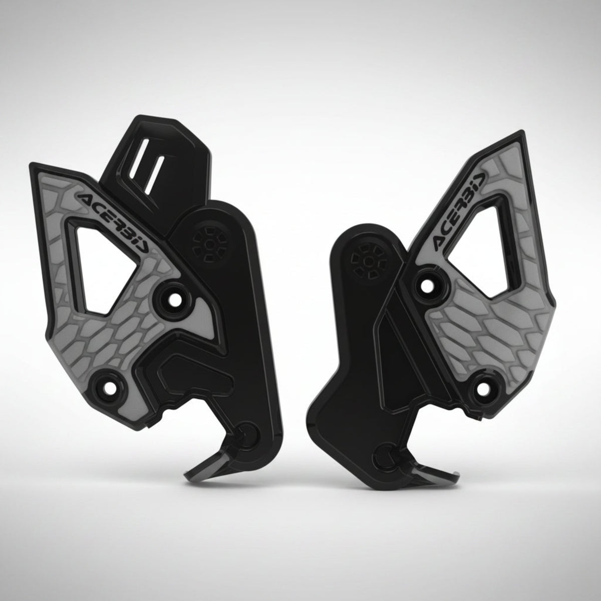 Black Acerbis X-Grip frame guards showing rubberized grip panels installed on a CFMOTO Ibex 450 adventure motorcycle.