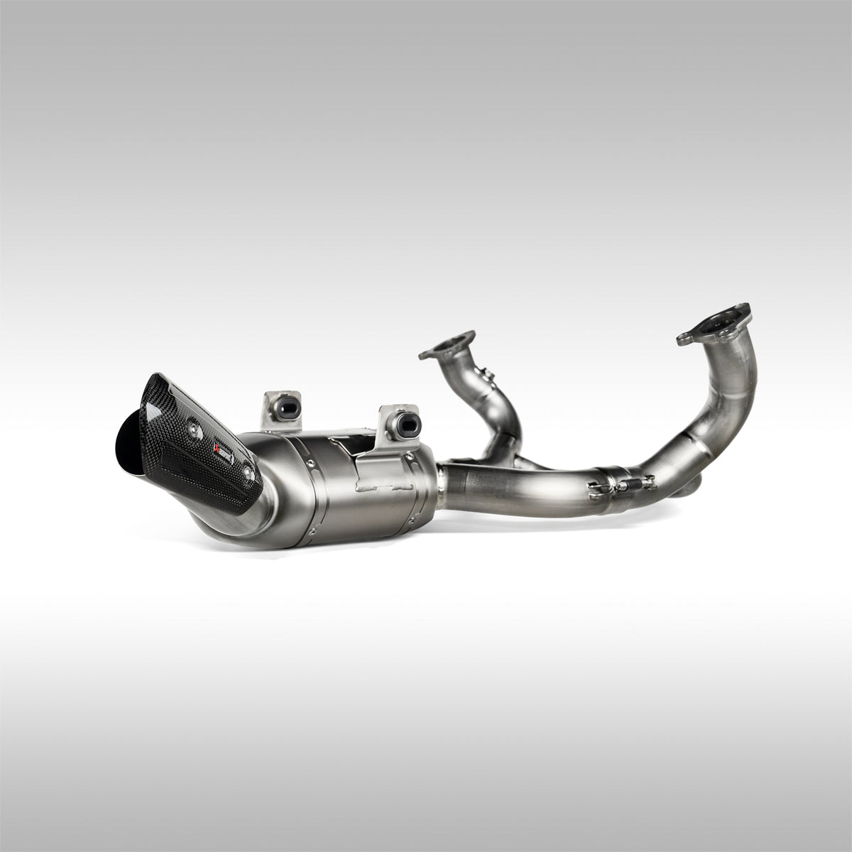 Akrapovic titanium header for BMW R1300GS on a light gray background