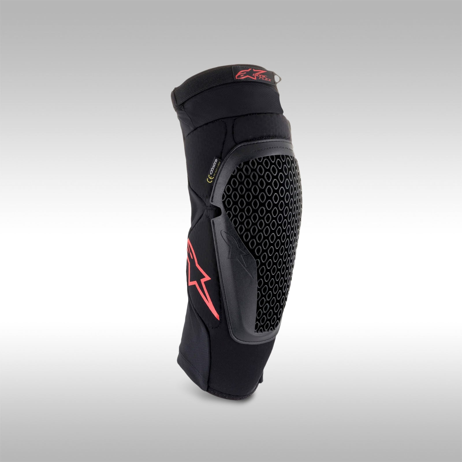 Alpinestars Bionic Flex Knee Protector featuring black stretch mesh, elasticated top strap, and silicon hems with a visible logo.