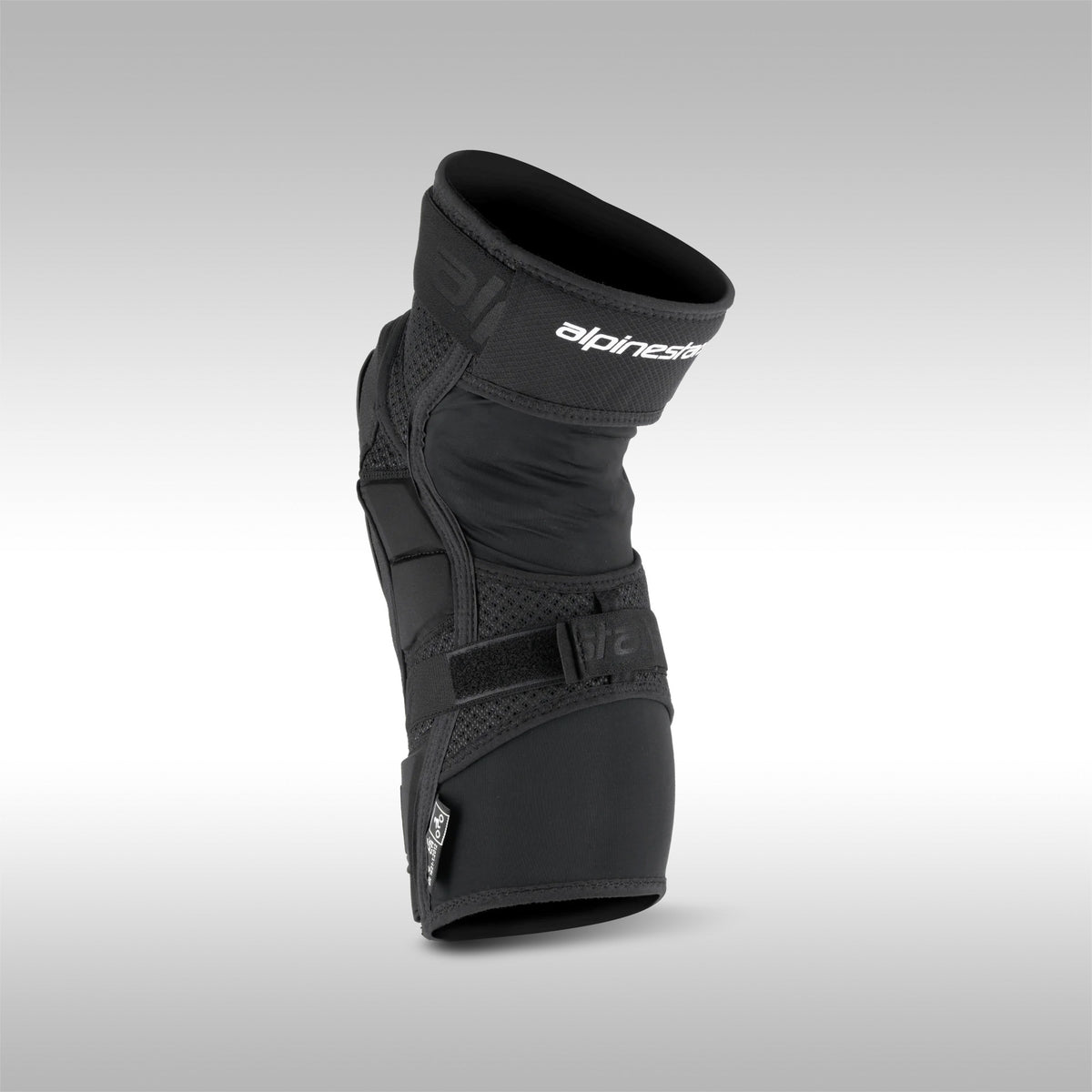 Alpinestars Bionic Pro Plasma Knee Protector, black with red accents, designed for off-road motorcycle riding, featuring straps and protective padding.