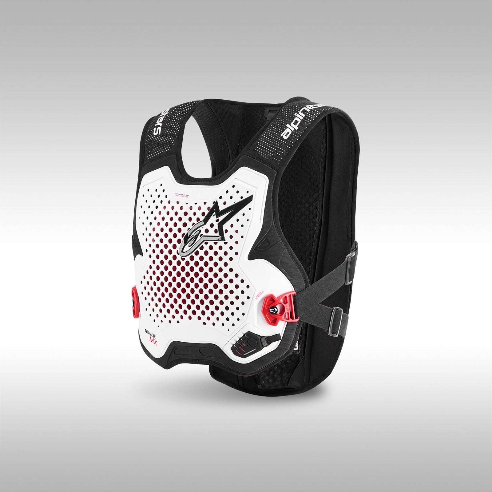 Black and white Alpinestars protective vest with red accents on a gray background