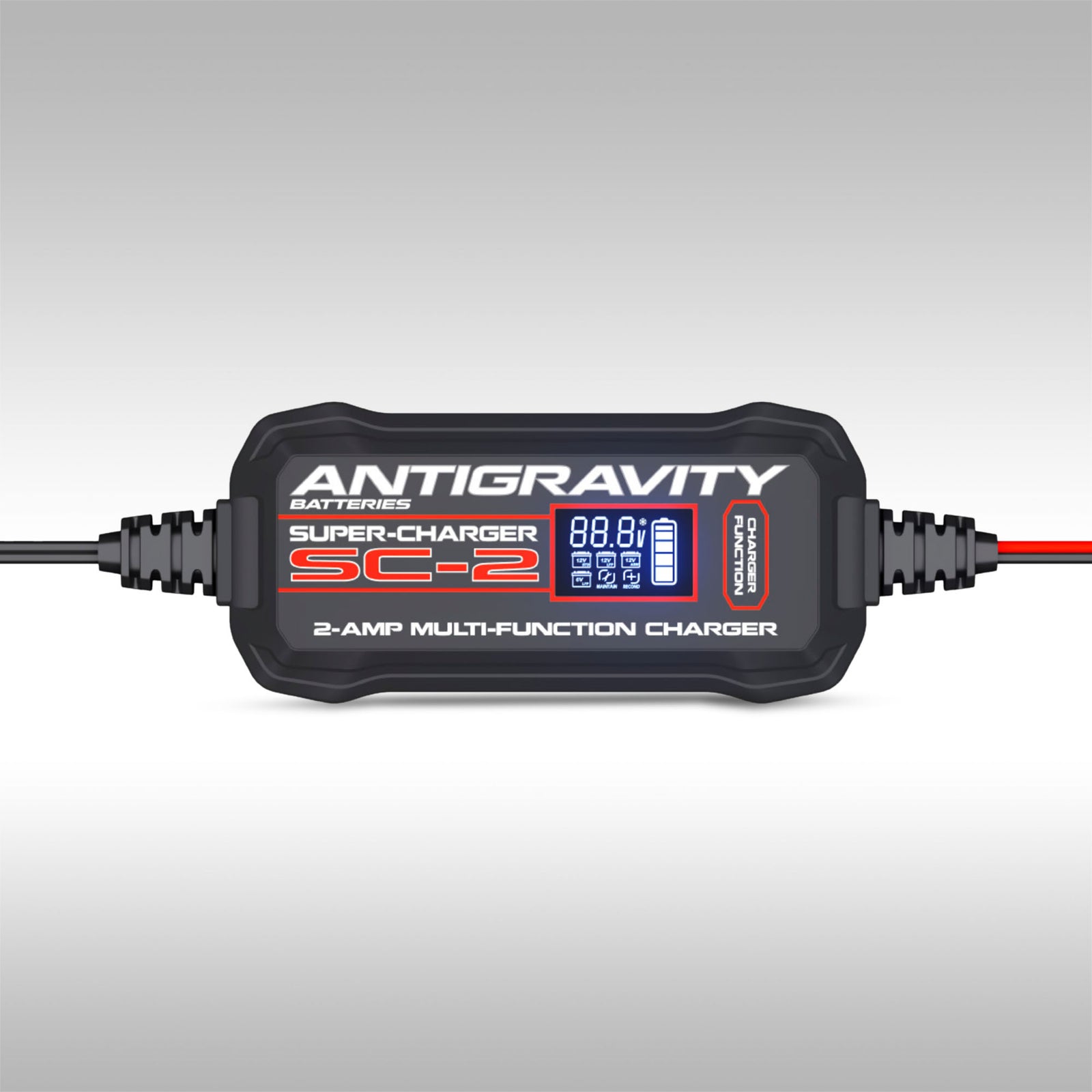Antigravity SC-2 2-Amp Super-Charger battery charger with LCD display and cables.