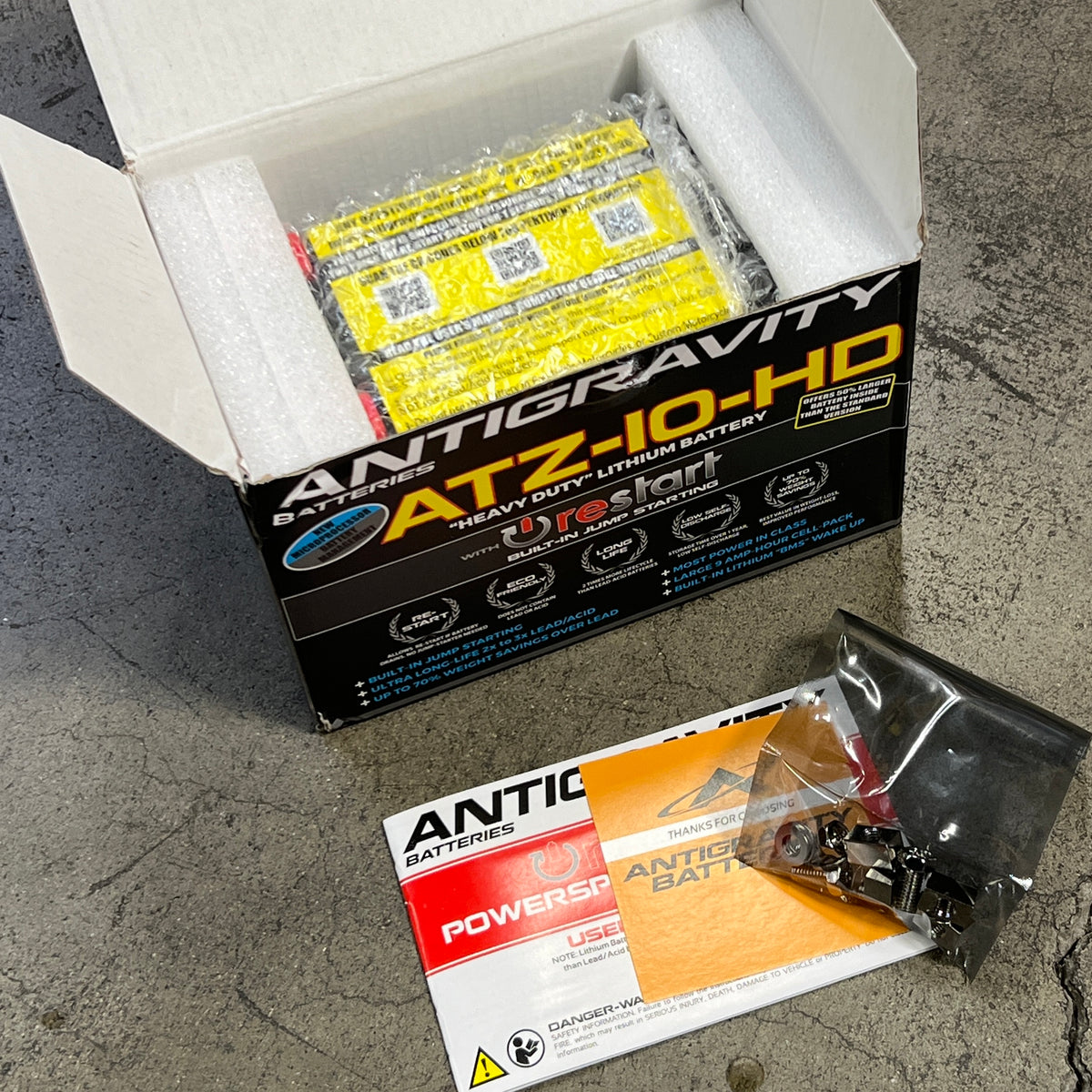 Antigravity ATZ-10-HD battery packaging on a concrete floor