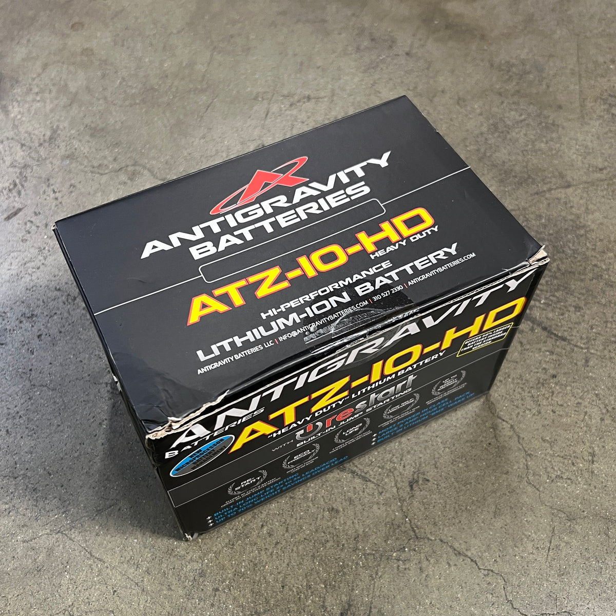 Antigravity Batteries ATZ-10-HD packaging on a concrete floor