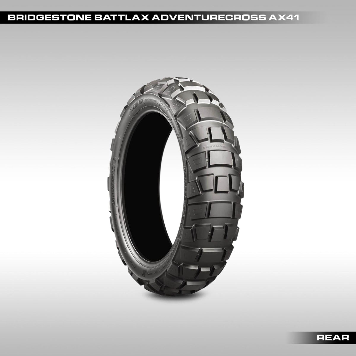 Two Bridgestone Battlax Adventurecross AX41 tire on a gray background