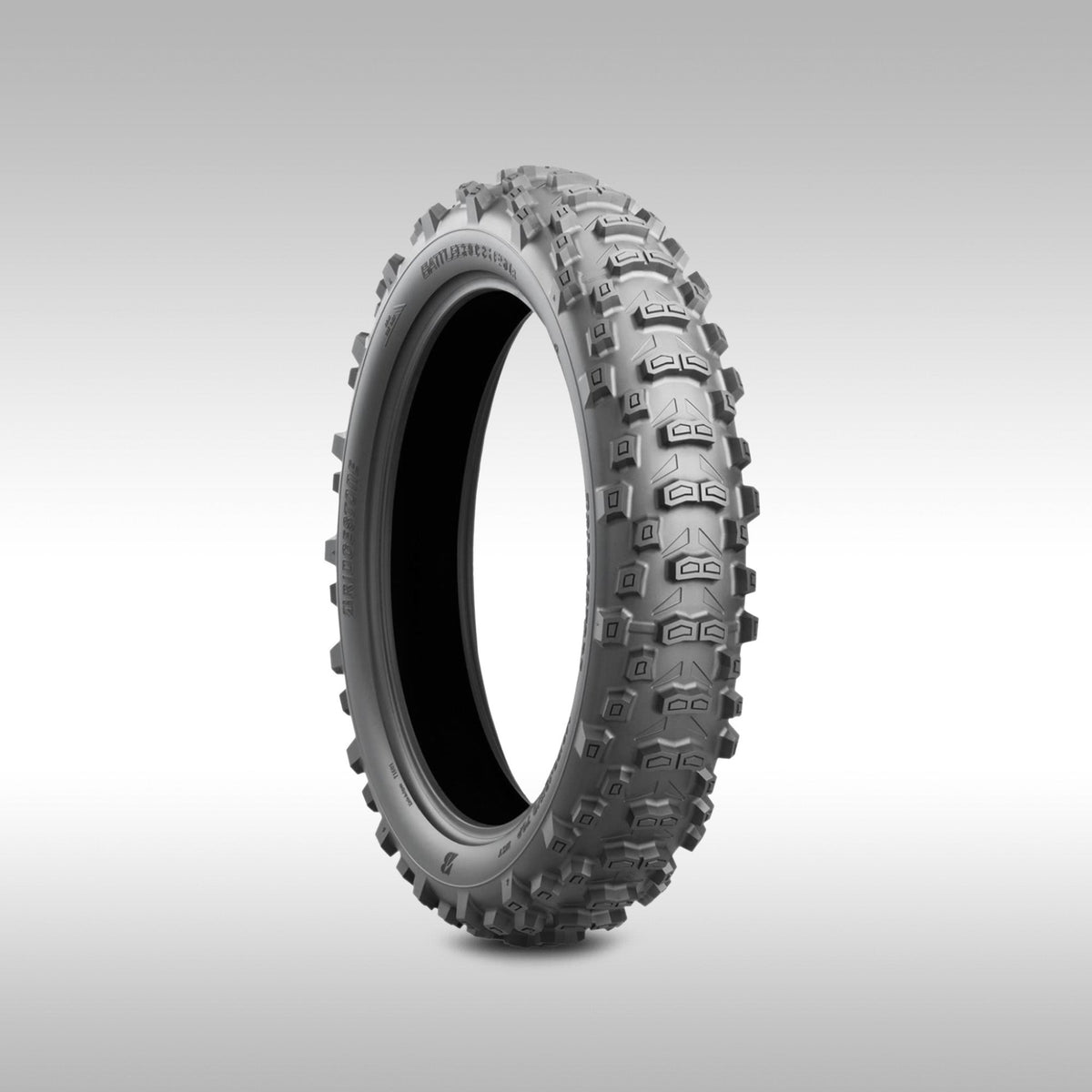 Bridgestone Battlecross E50 DOT approved enduro motorcycle tires showing the Castle Block tread pattern.