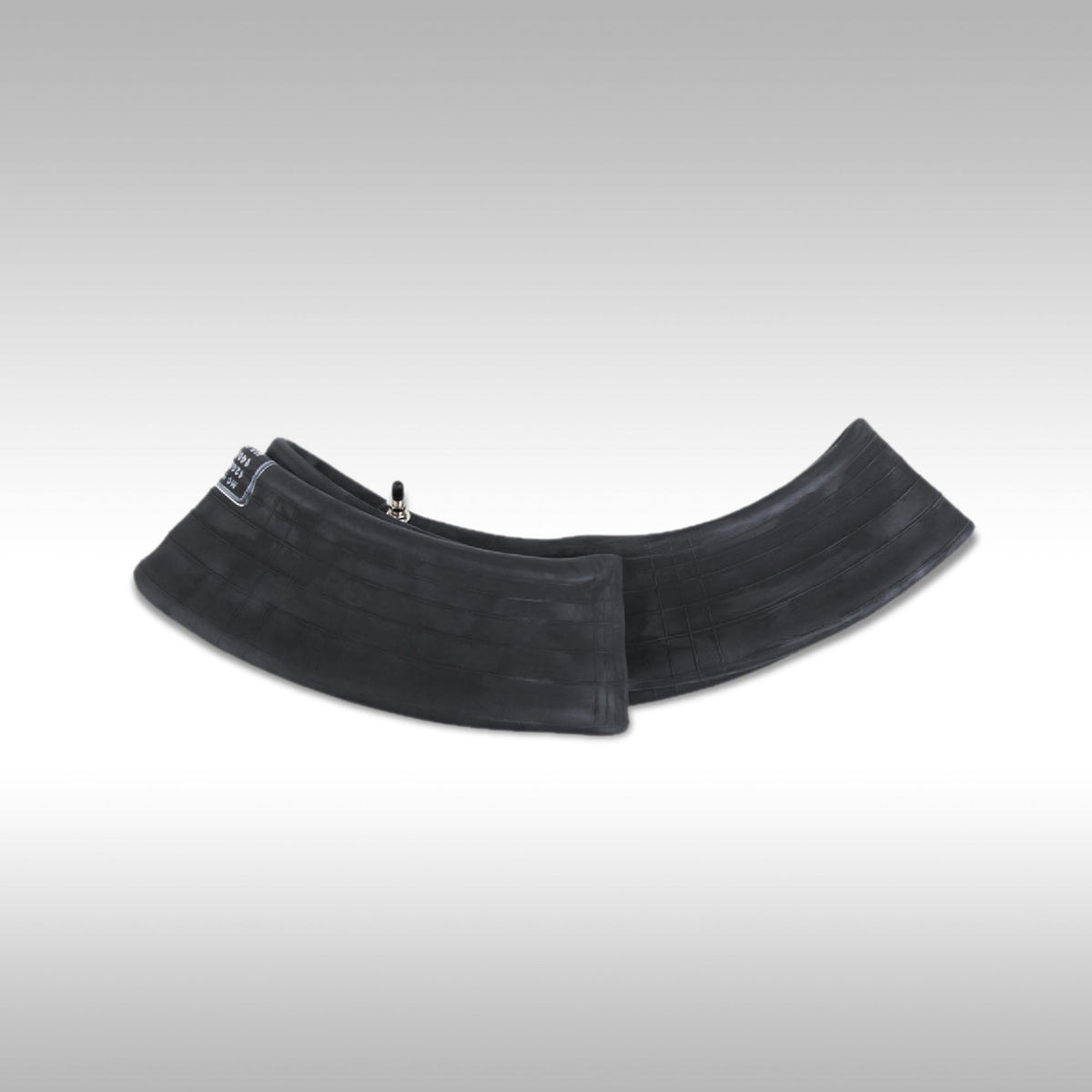 Bridgestone heavy duty natural rubber motorcycle inner tube showing the TR-4 straight metal valve stem.