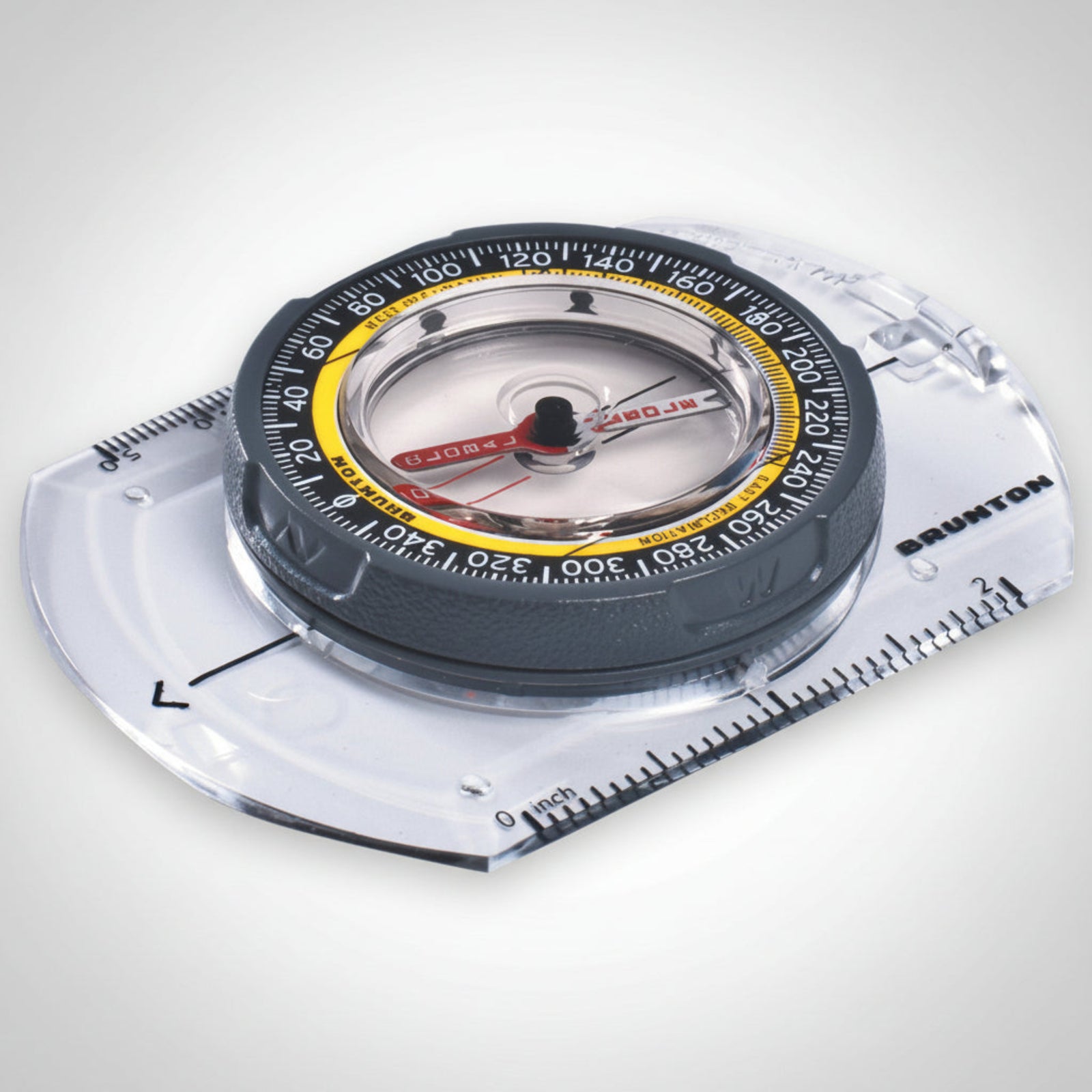 Brunton TruArc 3 baseplate compass showing the global needle, azimuth ring, and map scales.