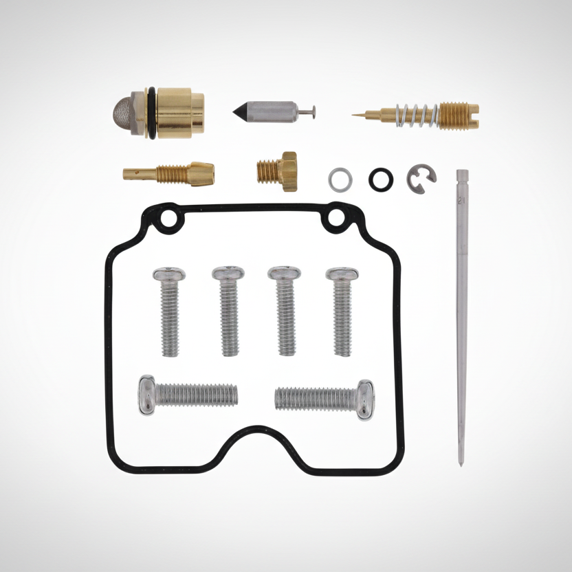 Carburetor rebuild kit for a Yamaha TW200 on a gray background.