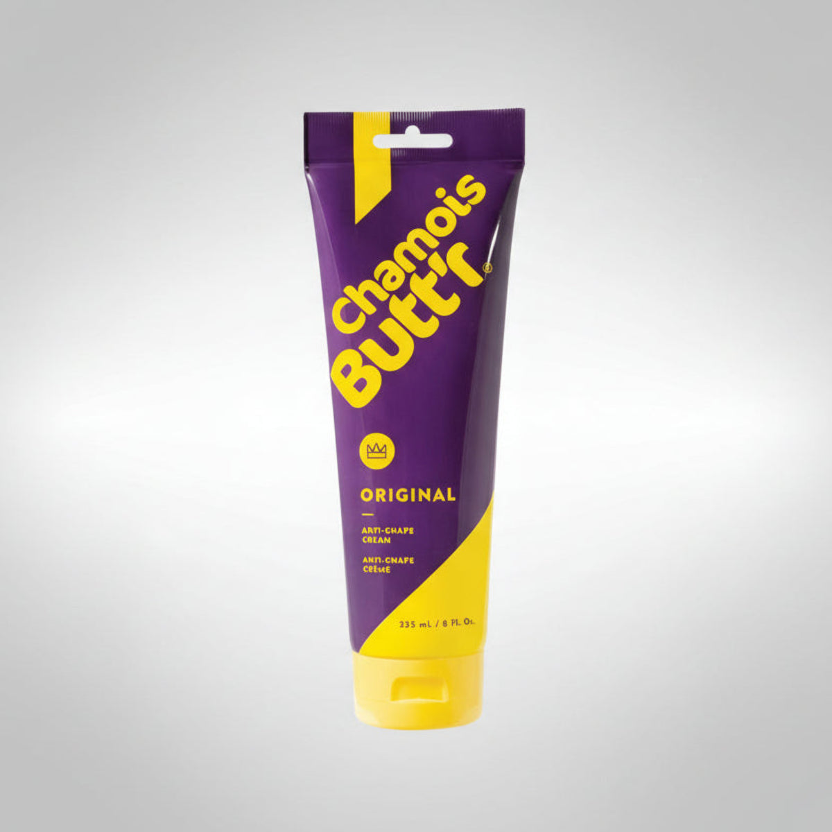 Chamois Butt'R anti-chafe cream tube with purple and yellow packaging on a white background