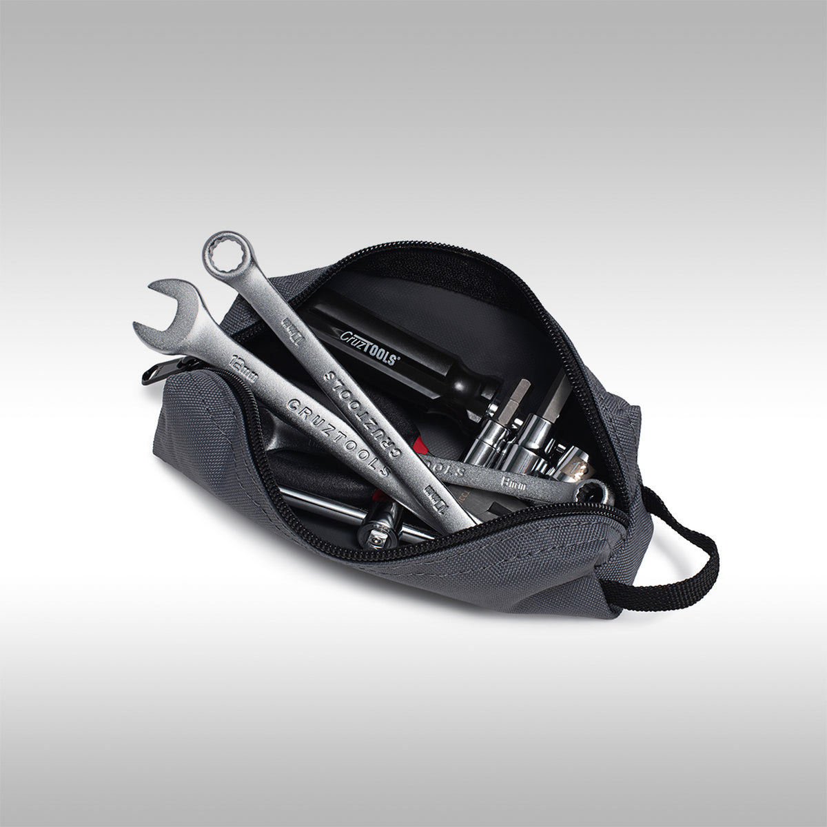 CruzTools tool kit in an open gray tool bag on a white background.