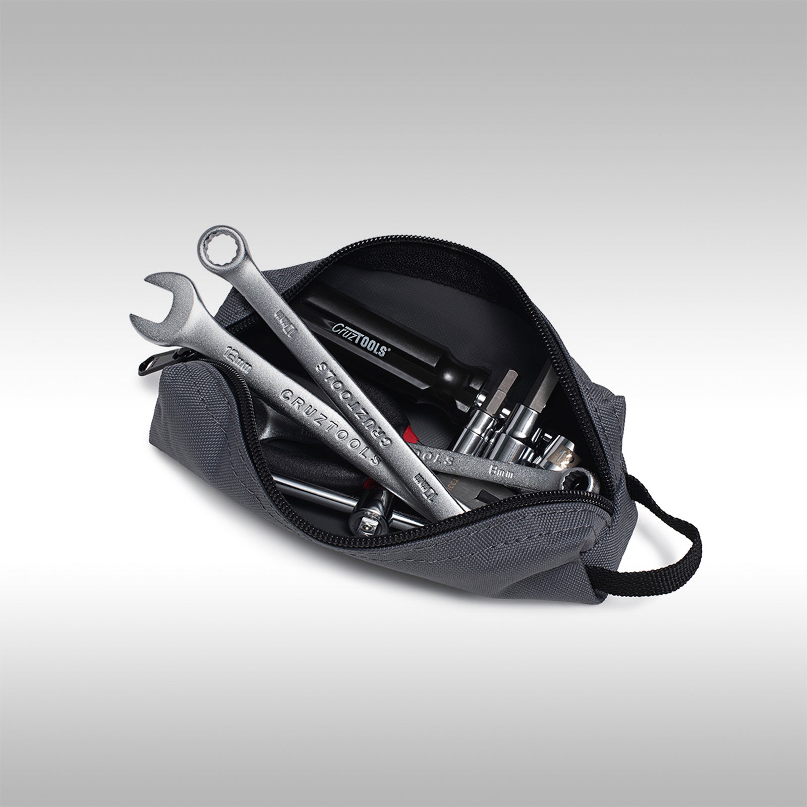 CruzTools tool kit in an open gray tool bag on a white background.