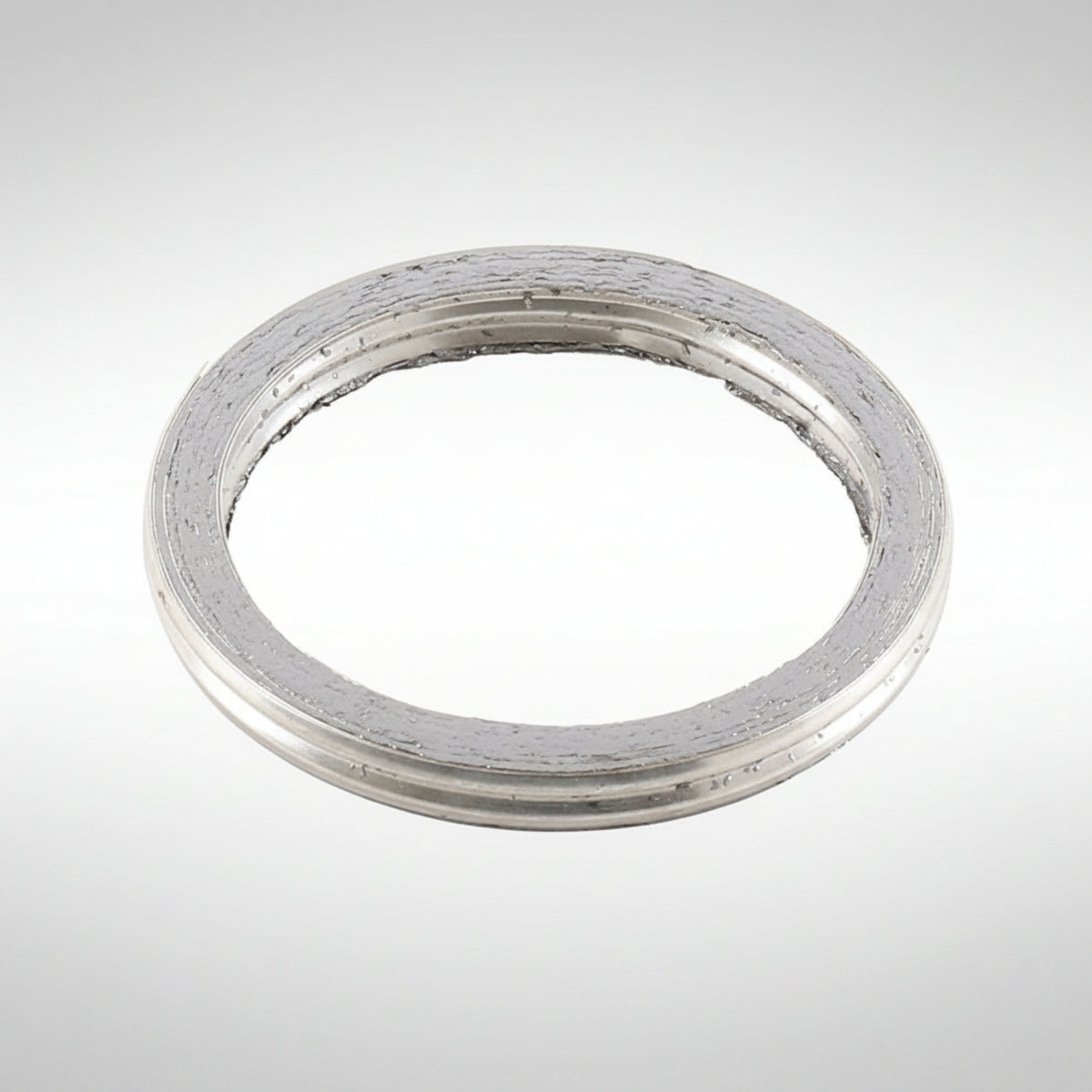 High-temperature copper exhaust crush gasket for motorcycle header pipes.