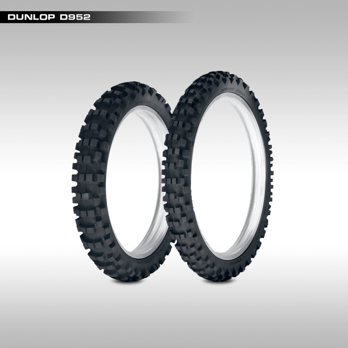 Two Dunlop D952 tires on a gray background
