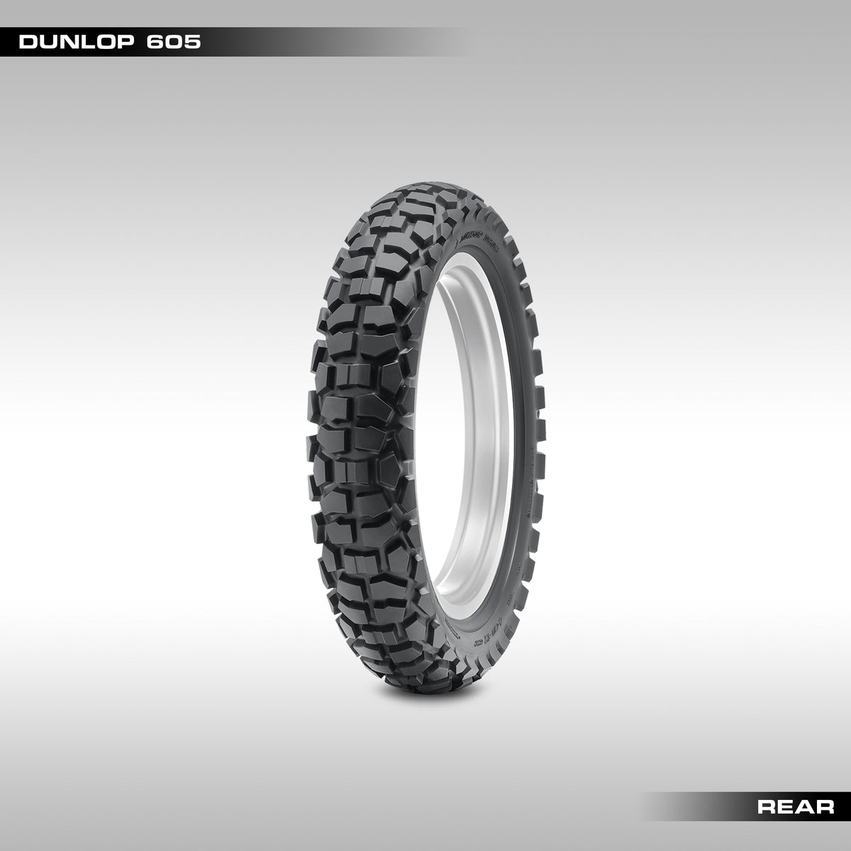 Rear Dunlop D605 tires with tread pattern visible on a gray background
