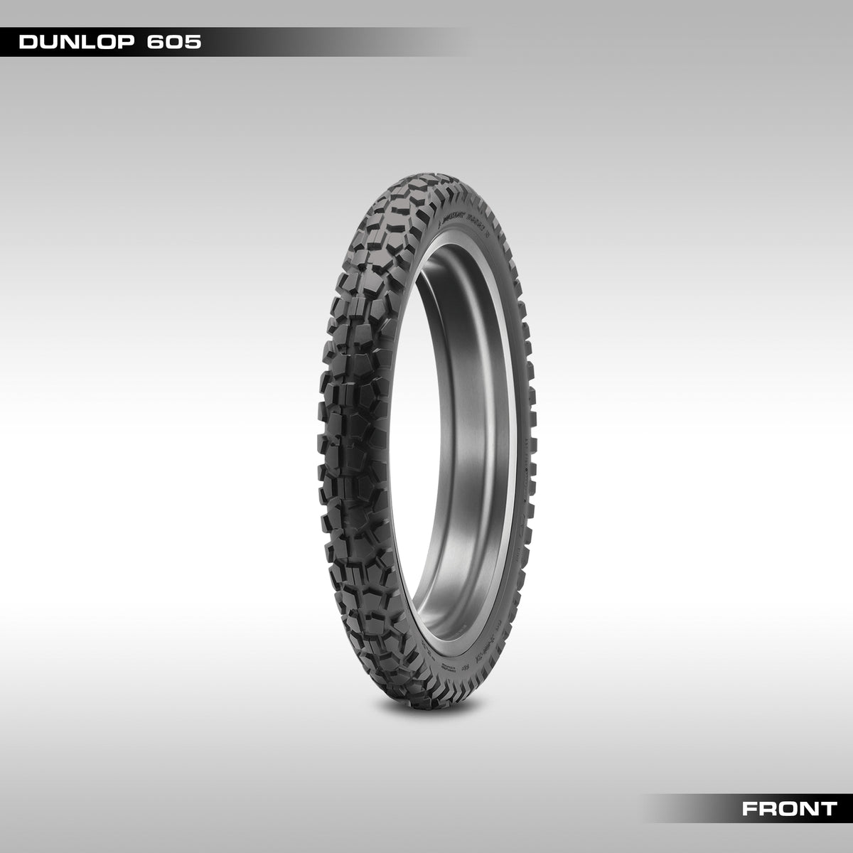 Front Dunlop D605 tire with tread pattern visible on a gray background