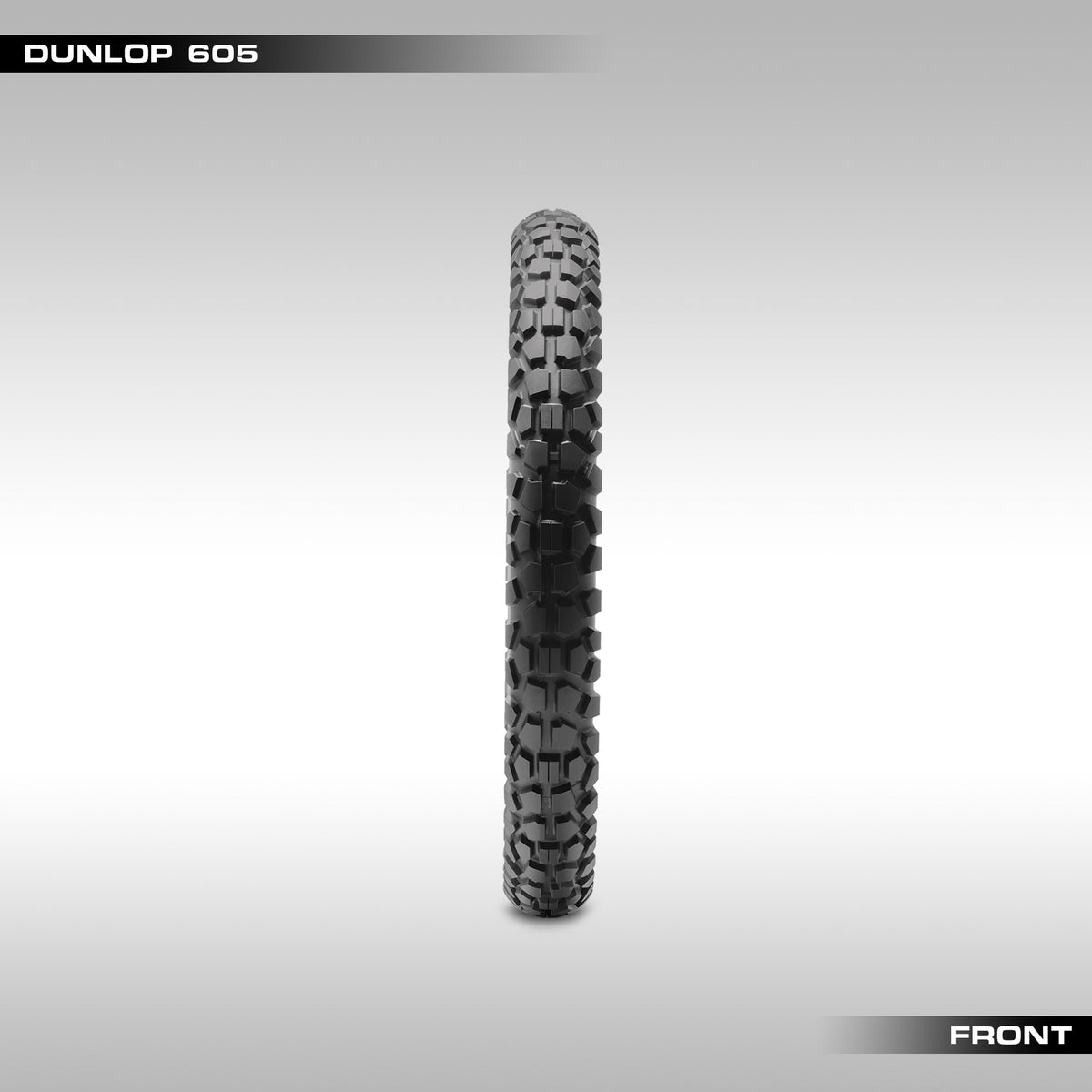 Front Dunlop D605 tire with tread pattern visible on a gray background