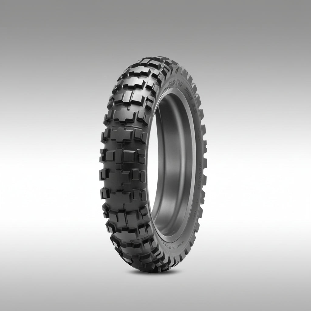 Dunlop 908RR adventure tire on a gray background