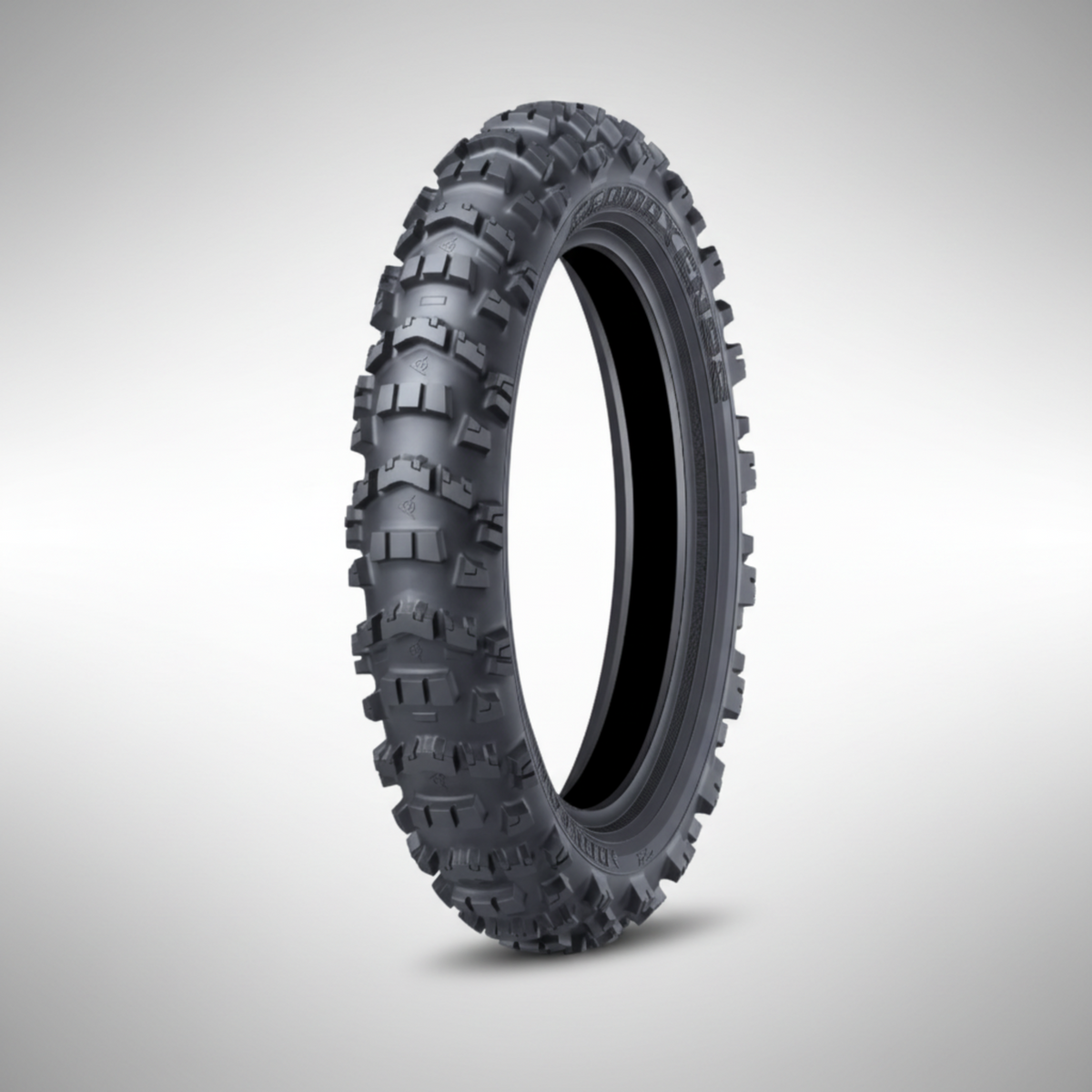 Dunlop Geomax EN92 off-road enduro motorcycle tire showing aggressive V-Block tread pattern.