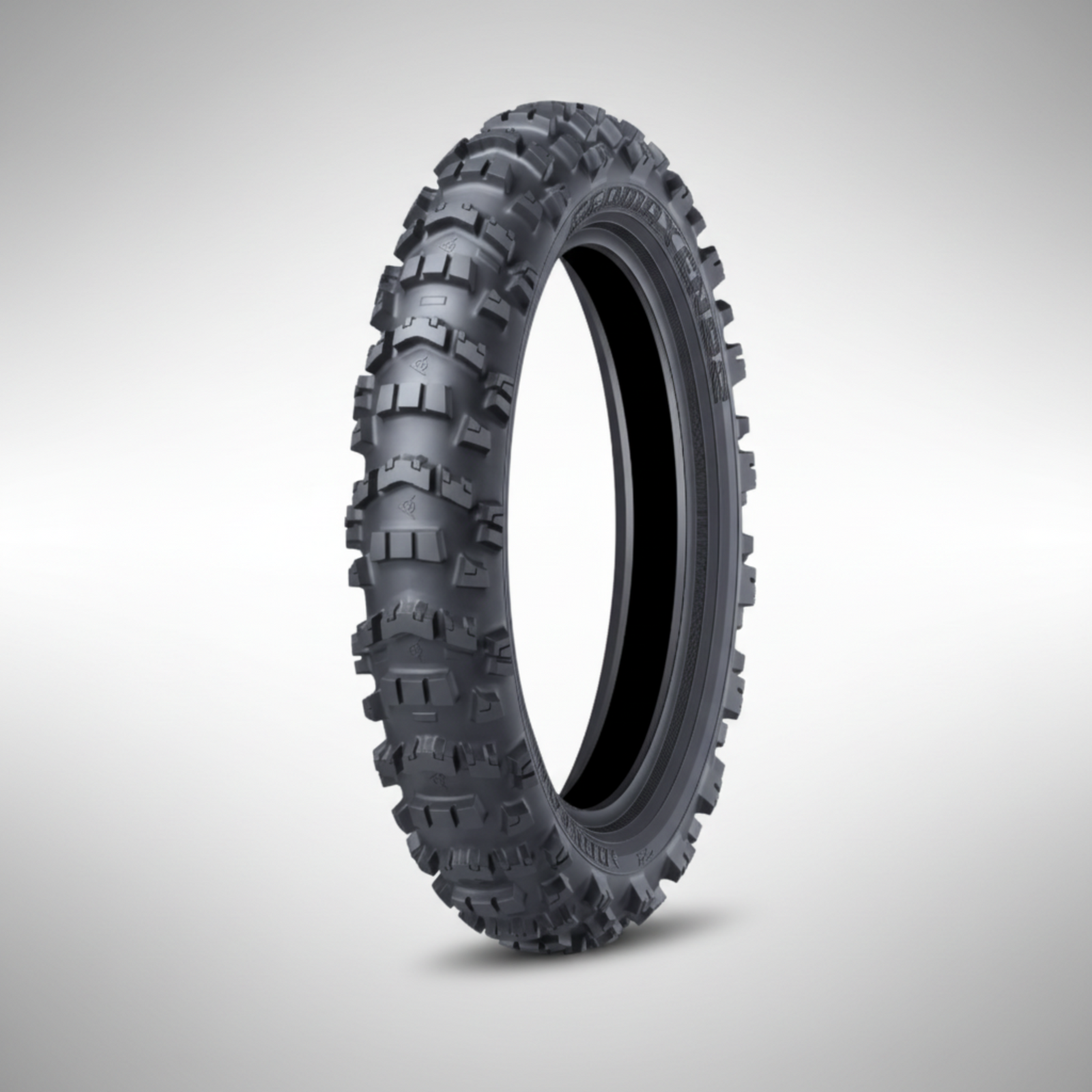 Dunlop Geomax EN92 off-road enduro motorcycle tire showing aggressive V-Block tread pattern.