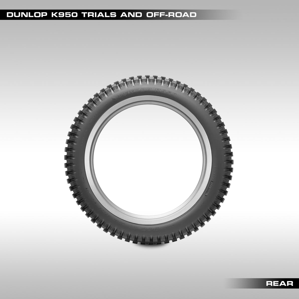Dunlop K950 trials and off-road tire on a gray background