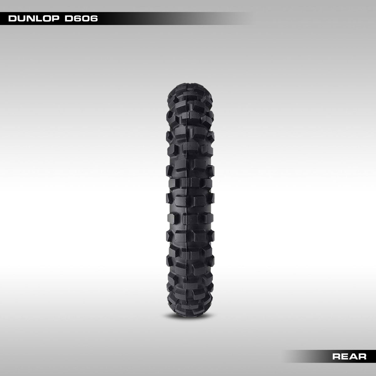 Rear Dunlop D606 dualsport tire on a gray background
