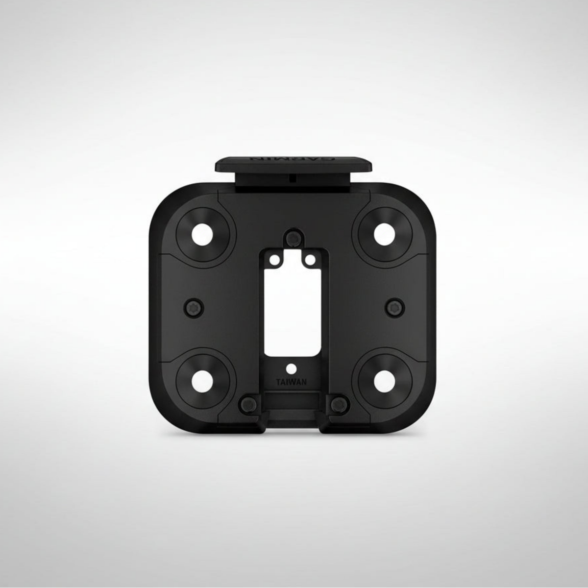 Black plastic Garmin XT3 mount plate on a light gray background