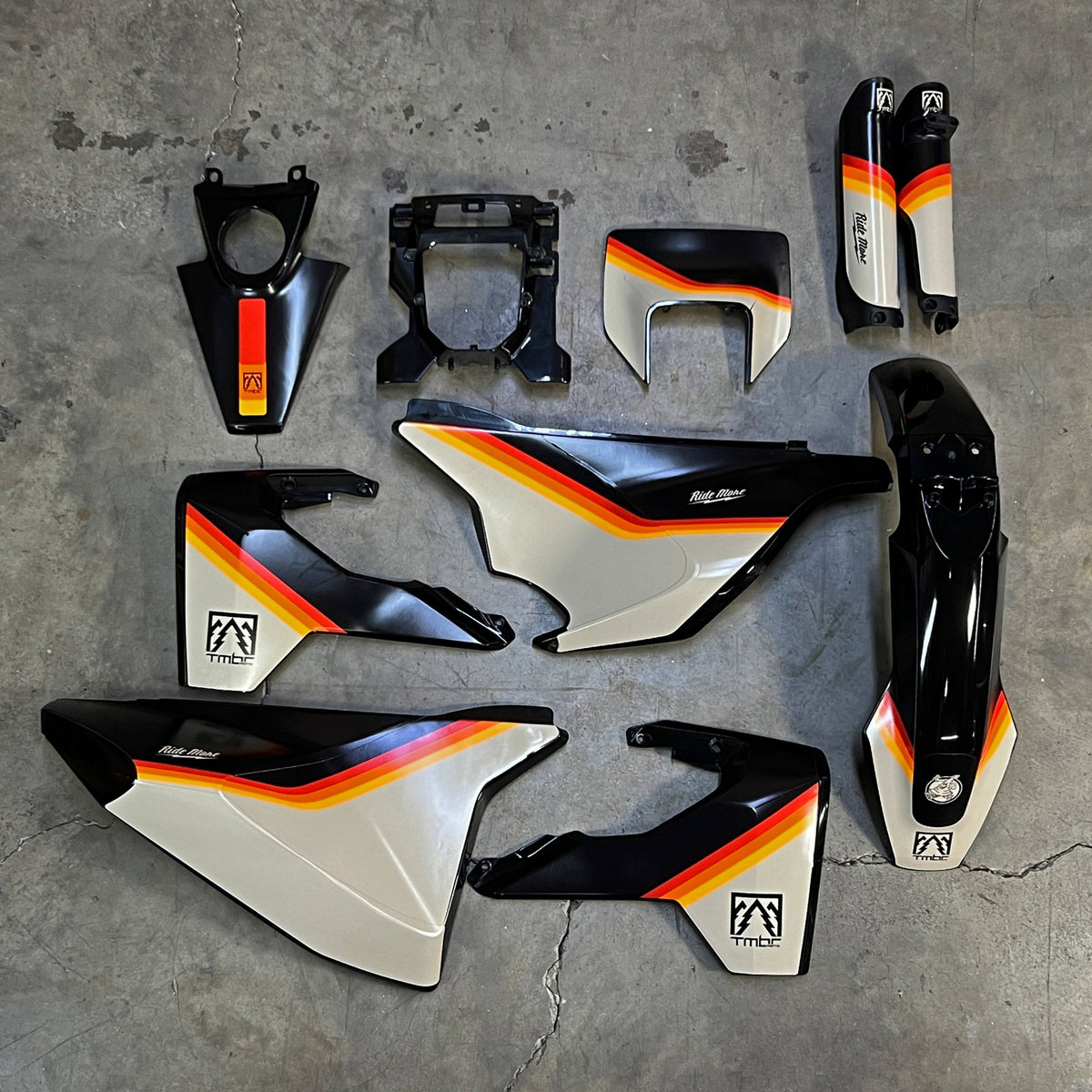 Husqvarna 701 Enduro Graphics Kit on black plastic body kit.
