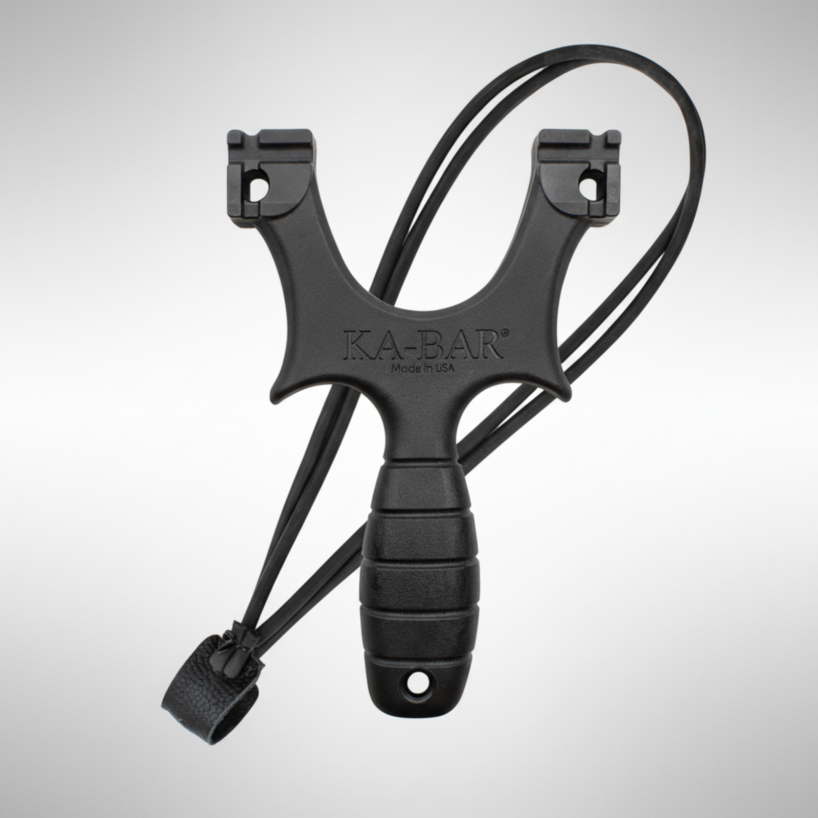 Black slingshot with 'KA-BAR' branding on a white background