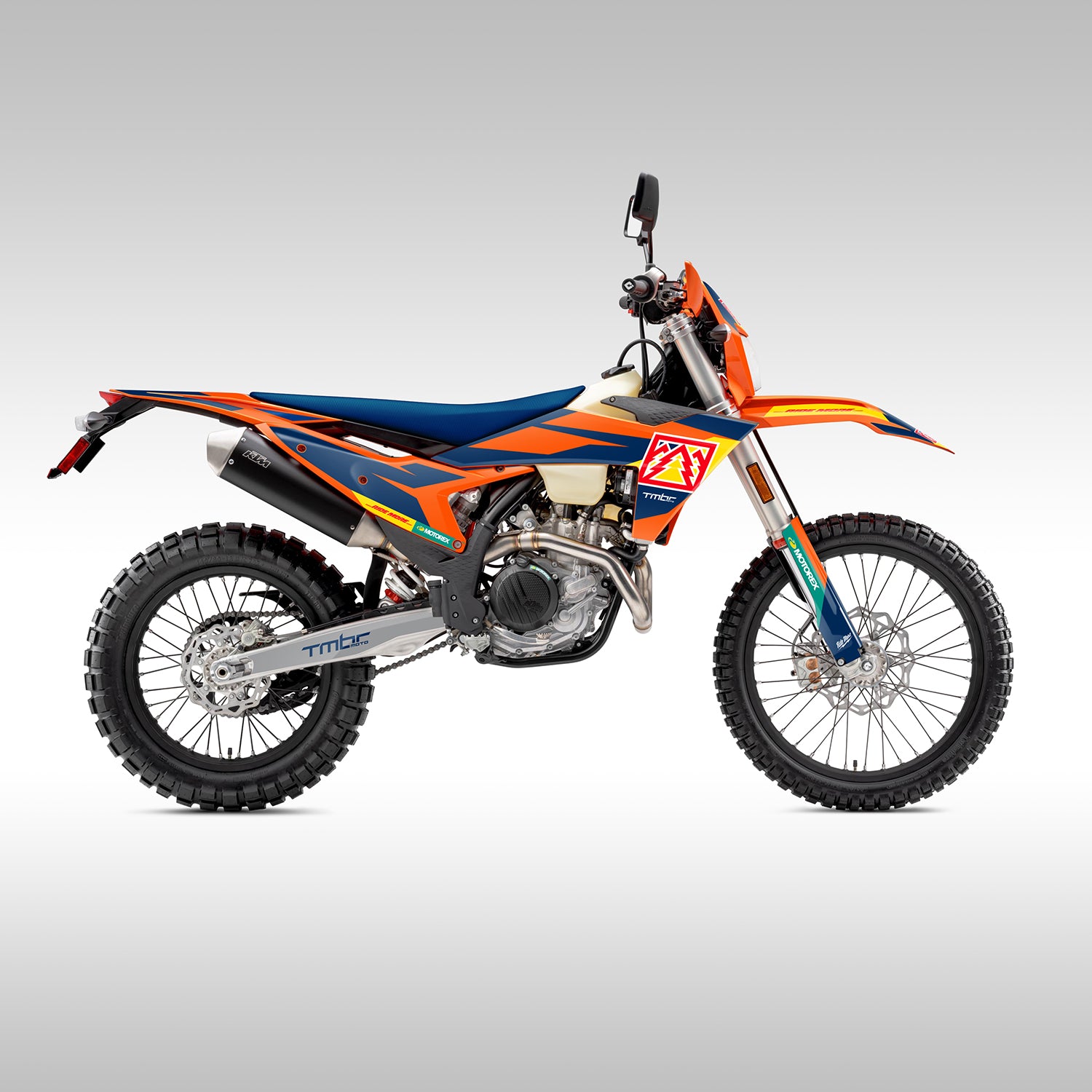 Orange, blue, yellow and red dirt bike graphics on a gray background