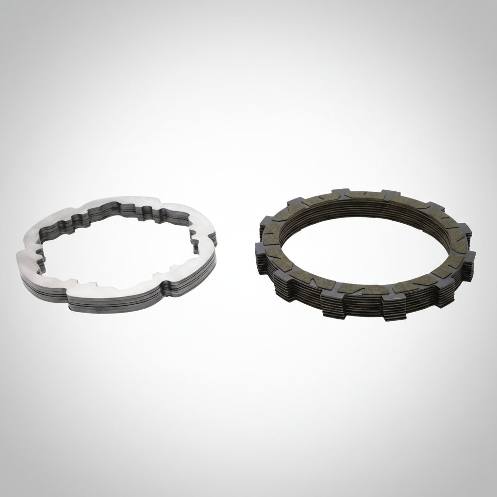 Rekluse clutch plates on a gray background