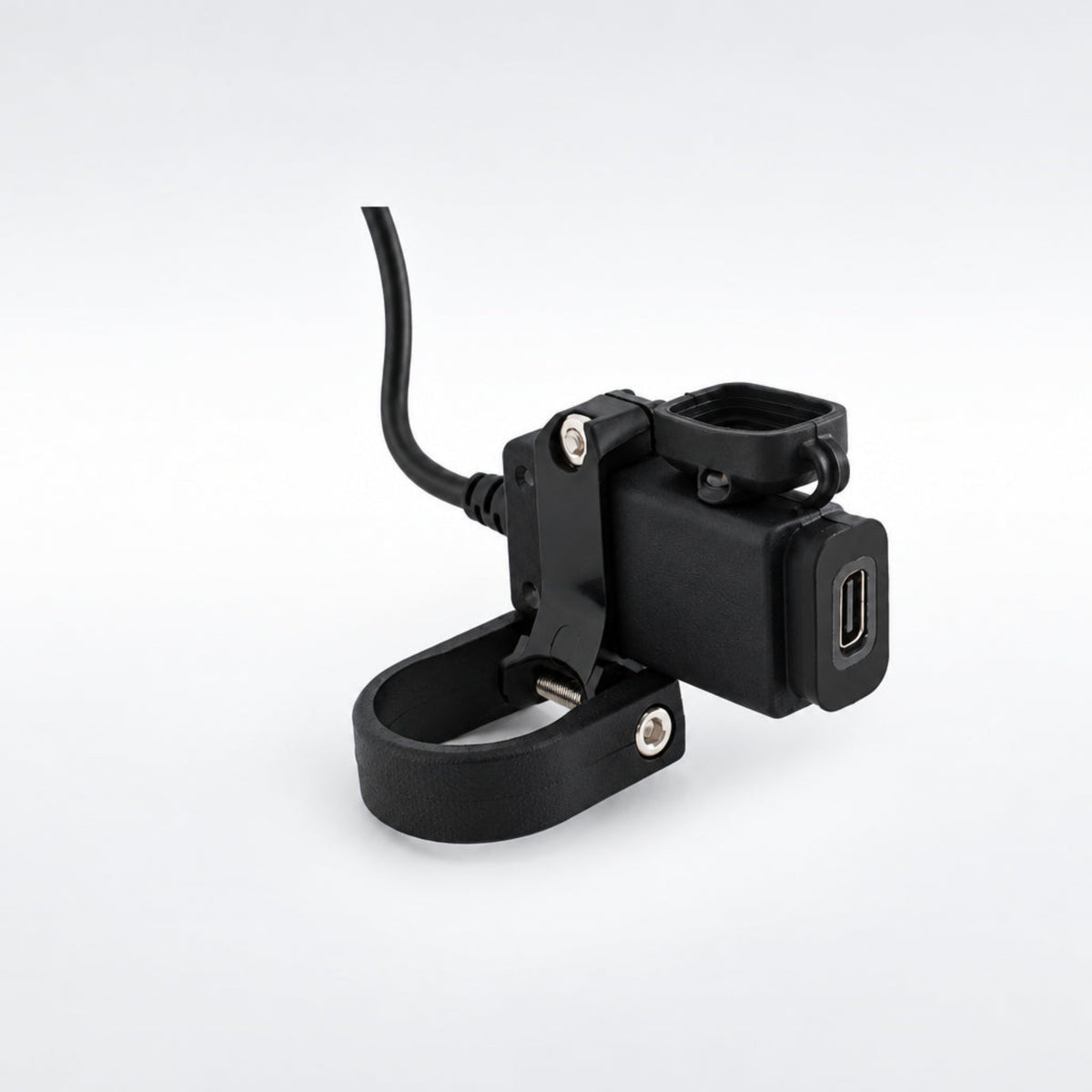 Koso KW005001 single port USB-C motorcycle charger showing the waterproof module, wiring harness, and included handlebar mounts.