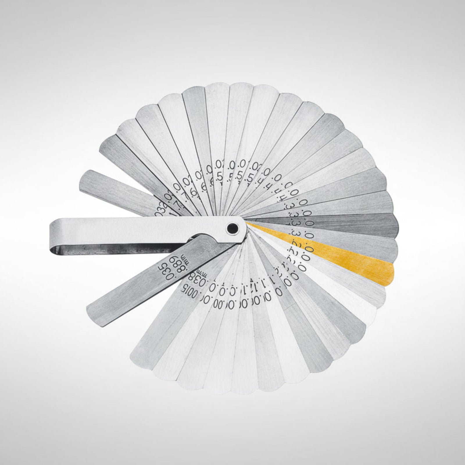 Lang Tools 36A 32-blade feeler gauge fanned out showing dual metric and standard thickness markings on tempered steel blades.