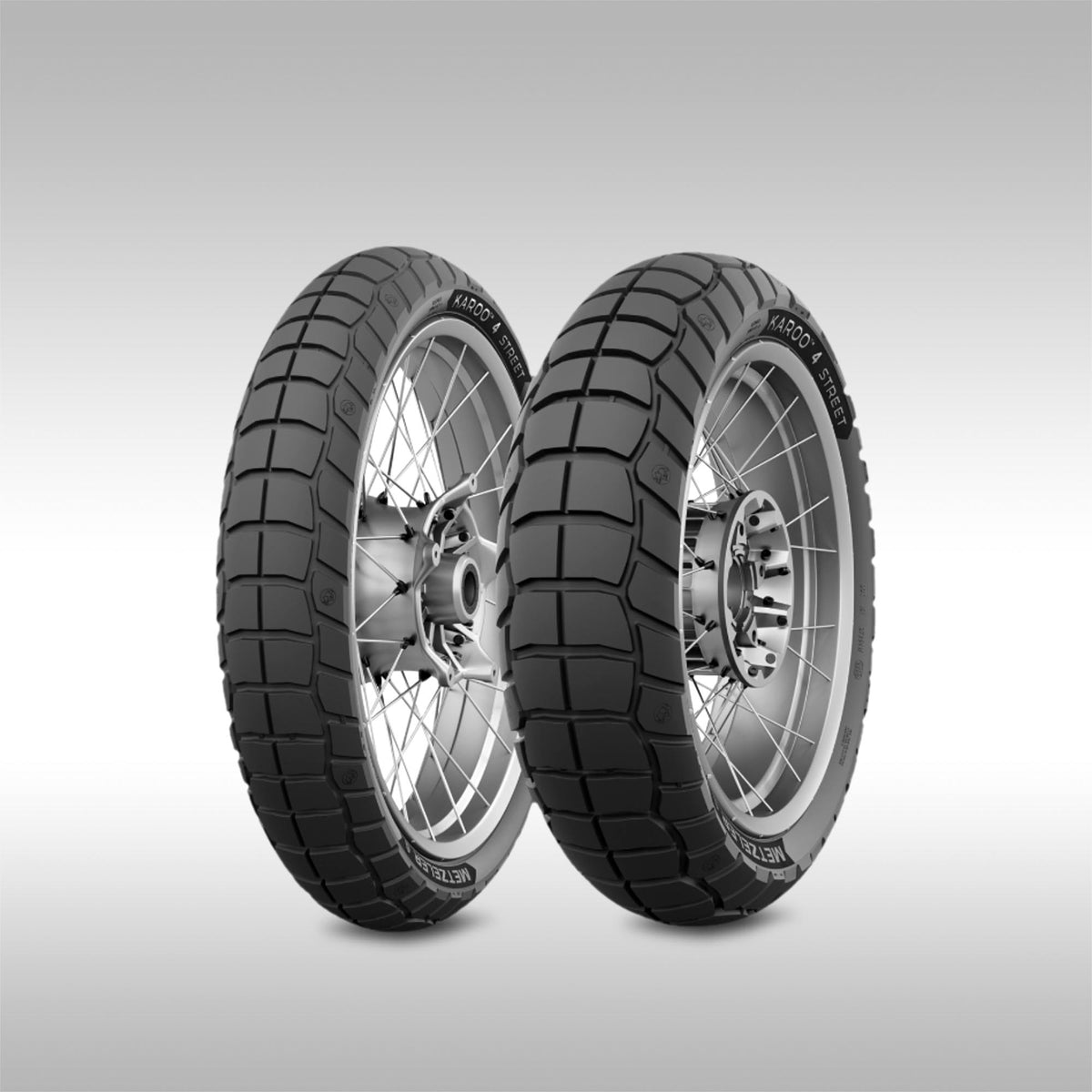 Metzeler Karoo 4 Street Motorcycle tires on a light gray background
