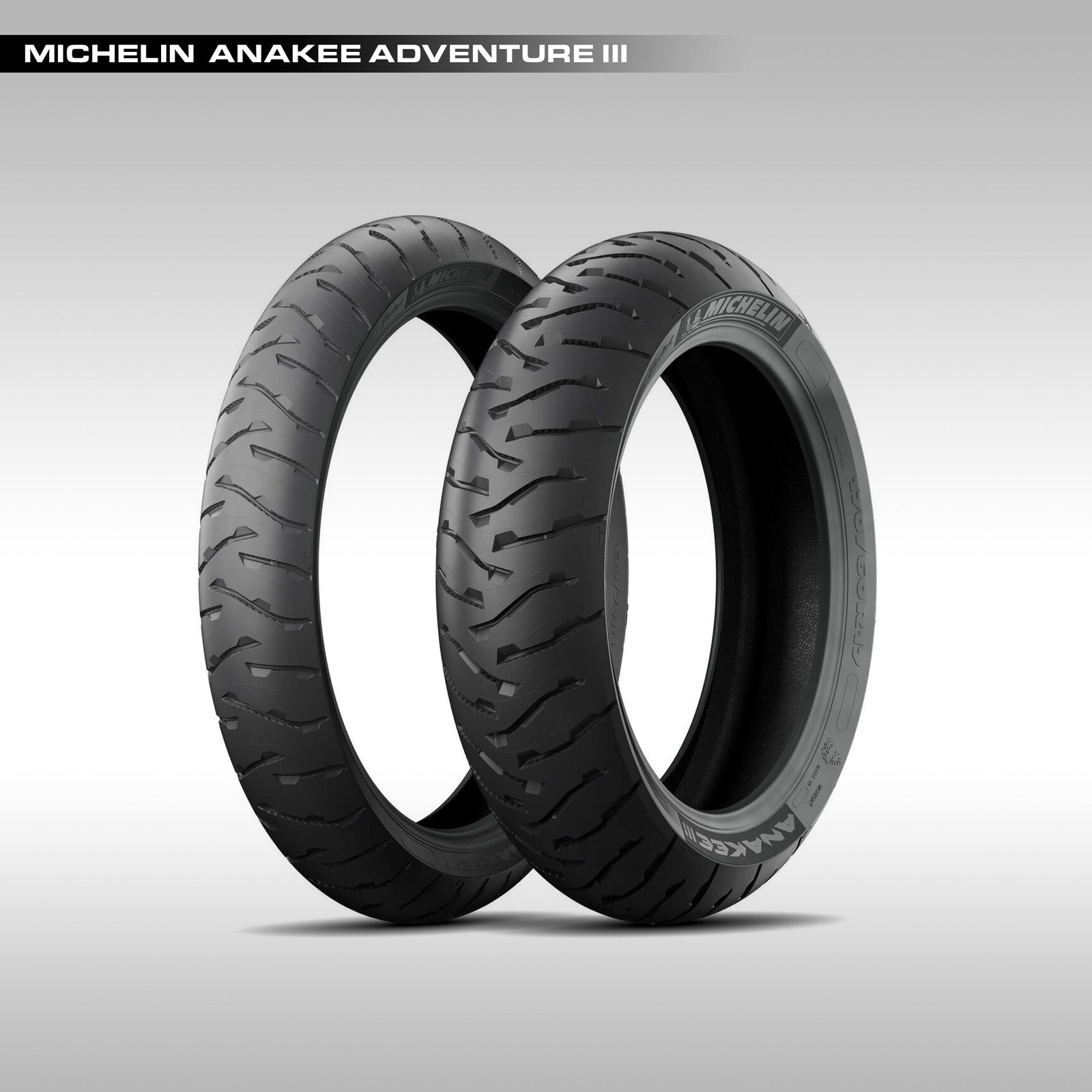 Michelin Anakee III adventure touring front and rear tires on a gray background