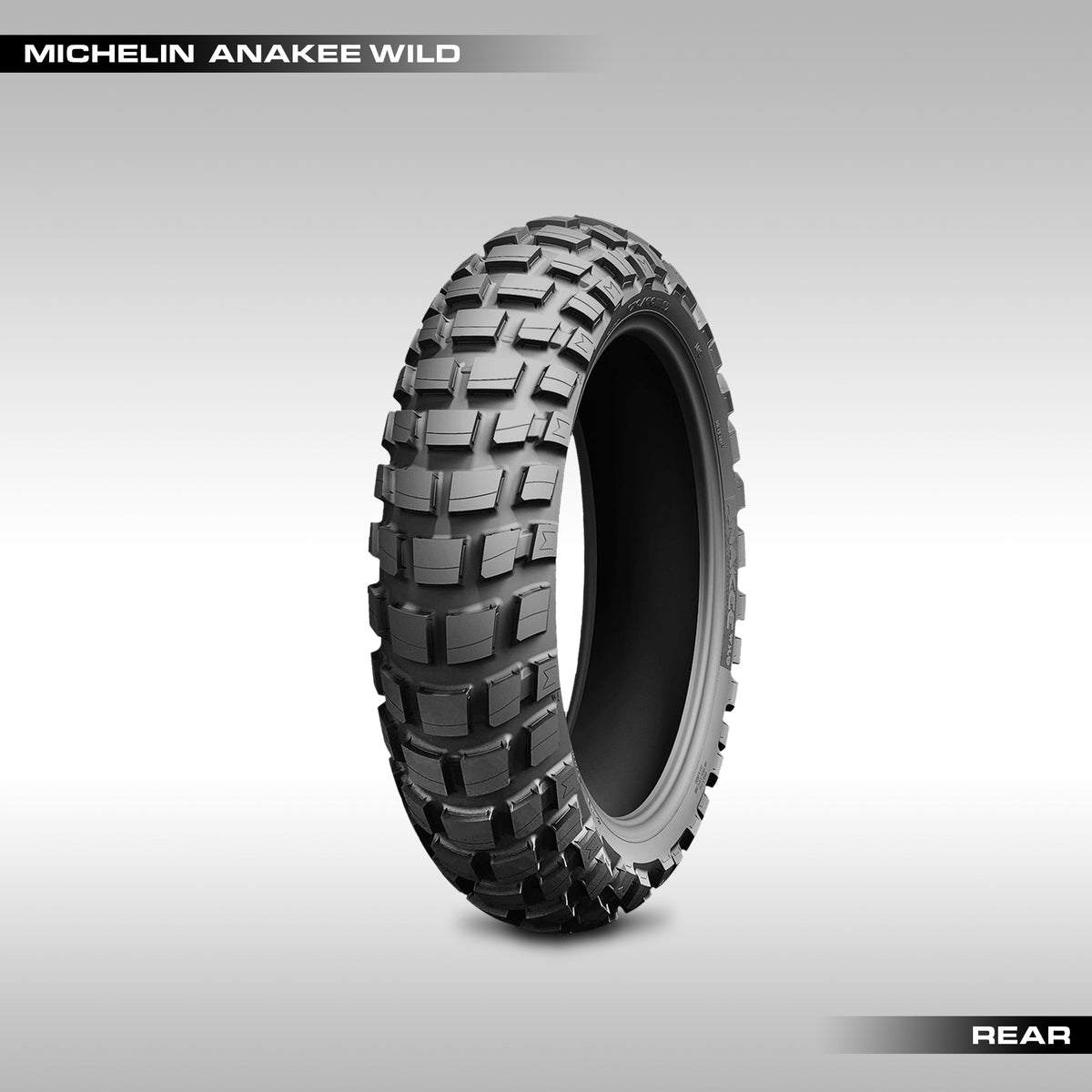Rear Michelin Anakee Wild motorcycle tire displayed against a grey background.