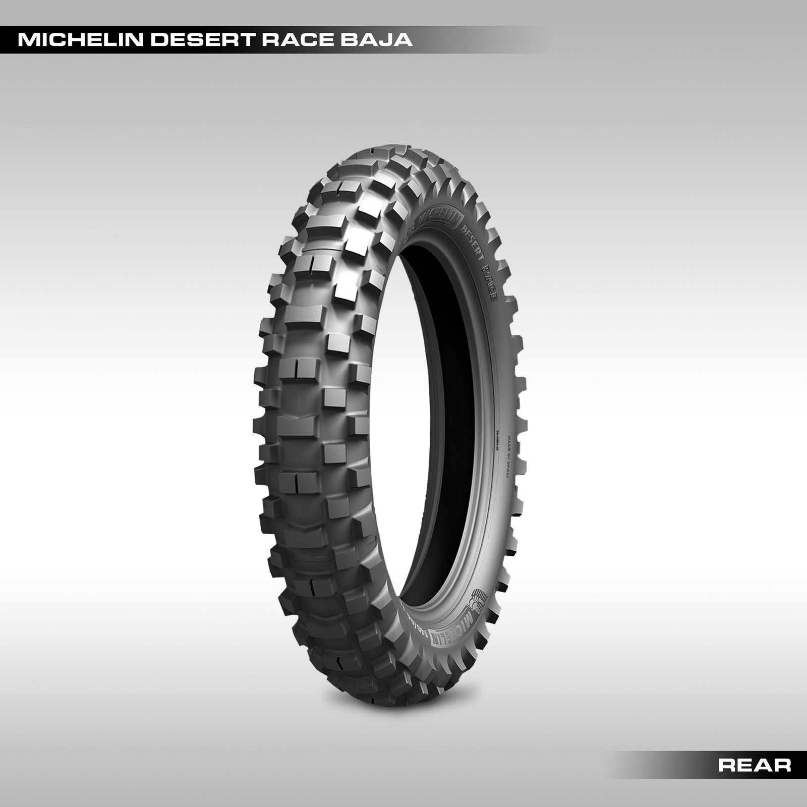 Michelin motorcycle tires Desert Race Baja offroad tire on a gray background. 