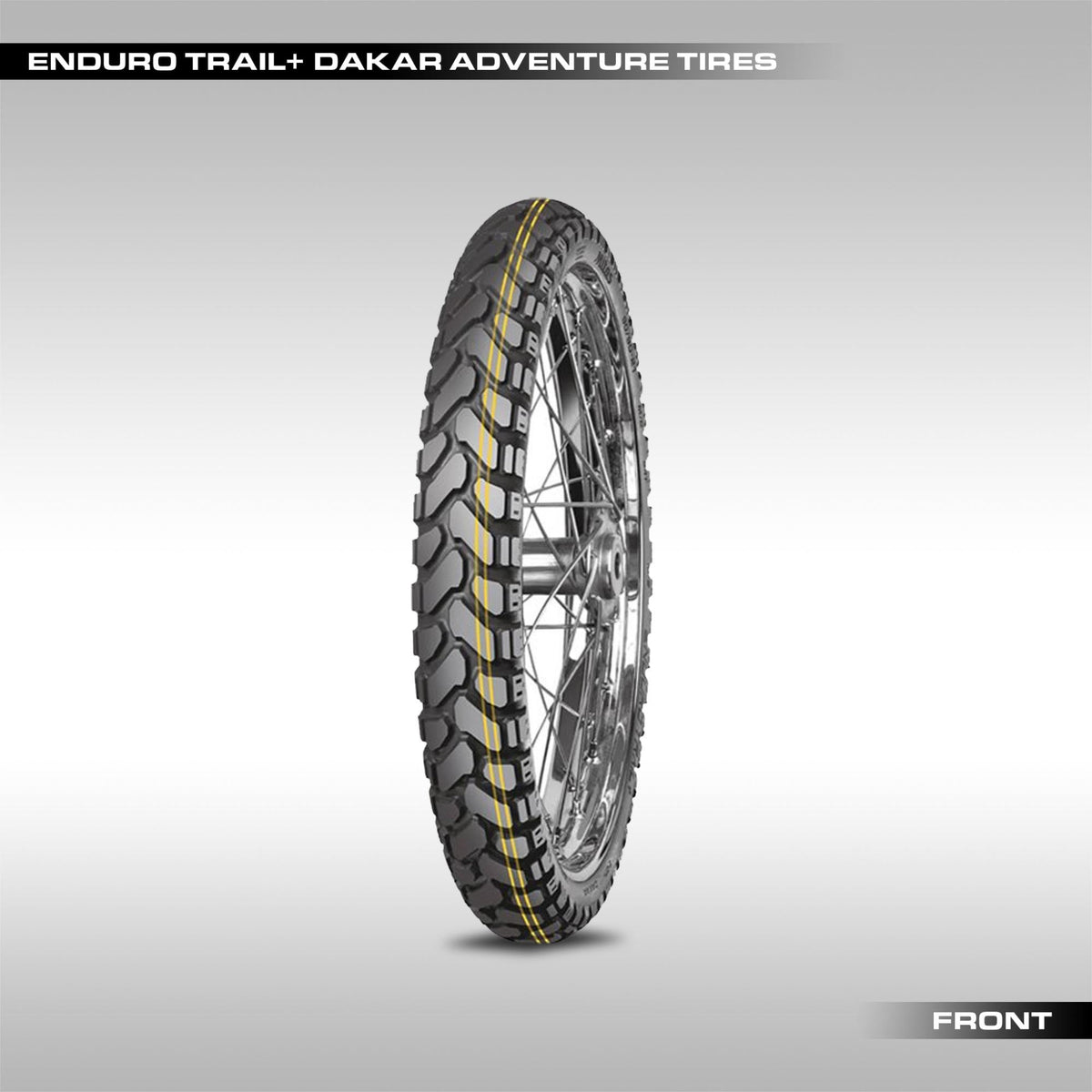 Mitas Enduro Trail+ Dakar adventure motorcycle tire showing the signature yellow stripe and large chevron block tread pattern.