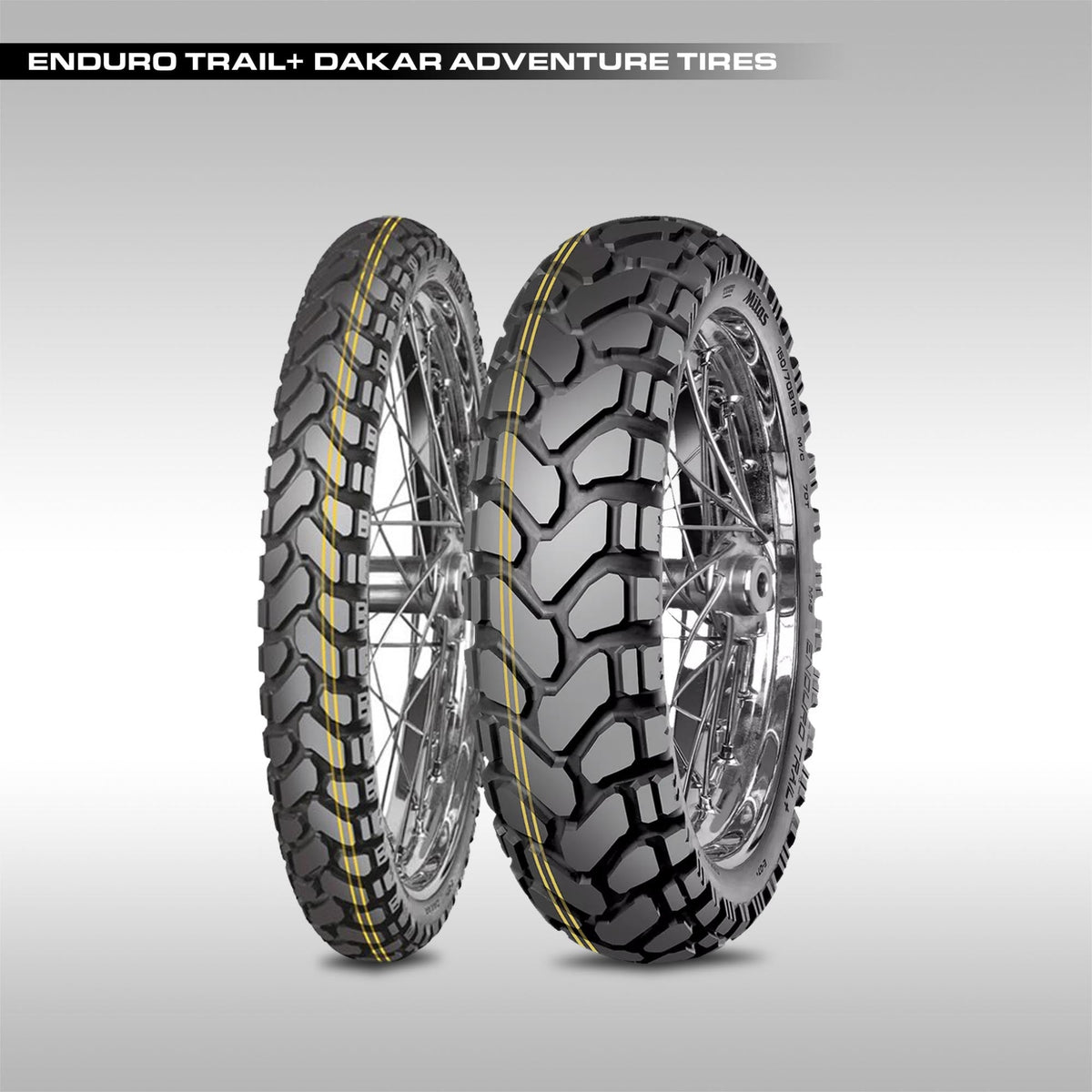 Mitas Enduro Trail+ Dakar adventure motorcycle tire showing the signature yellow stripe and large chevron block tread pattern.