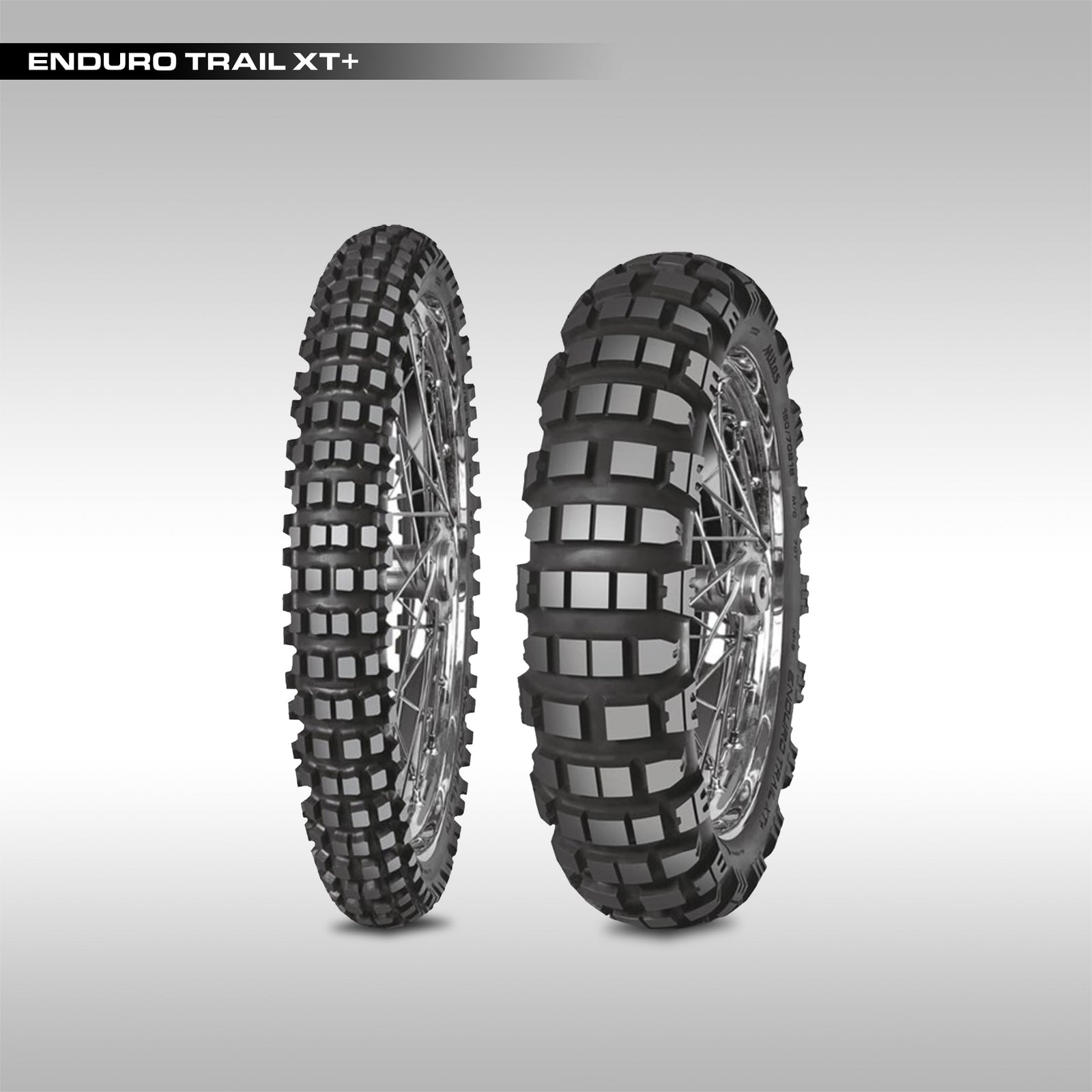 Front and rear Mitas Tyres Enduro Trail XT Plus tires,  displayed vertically with their tread patterns visible on a gray background